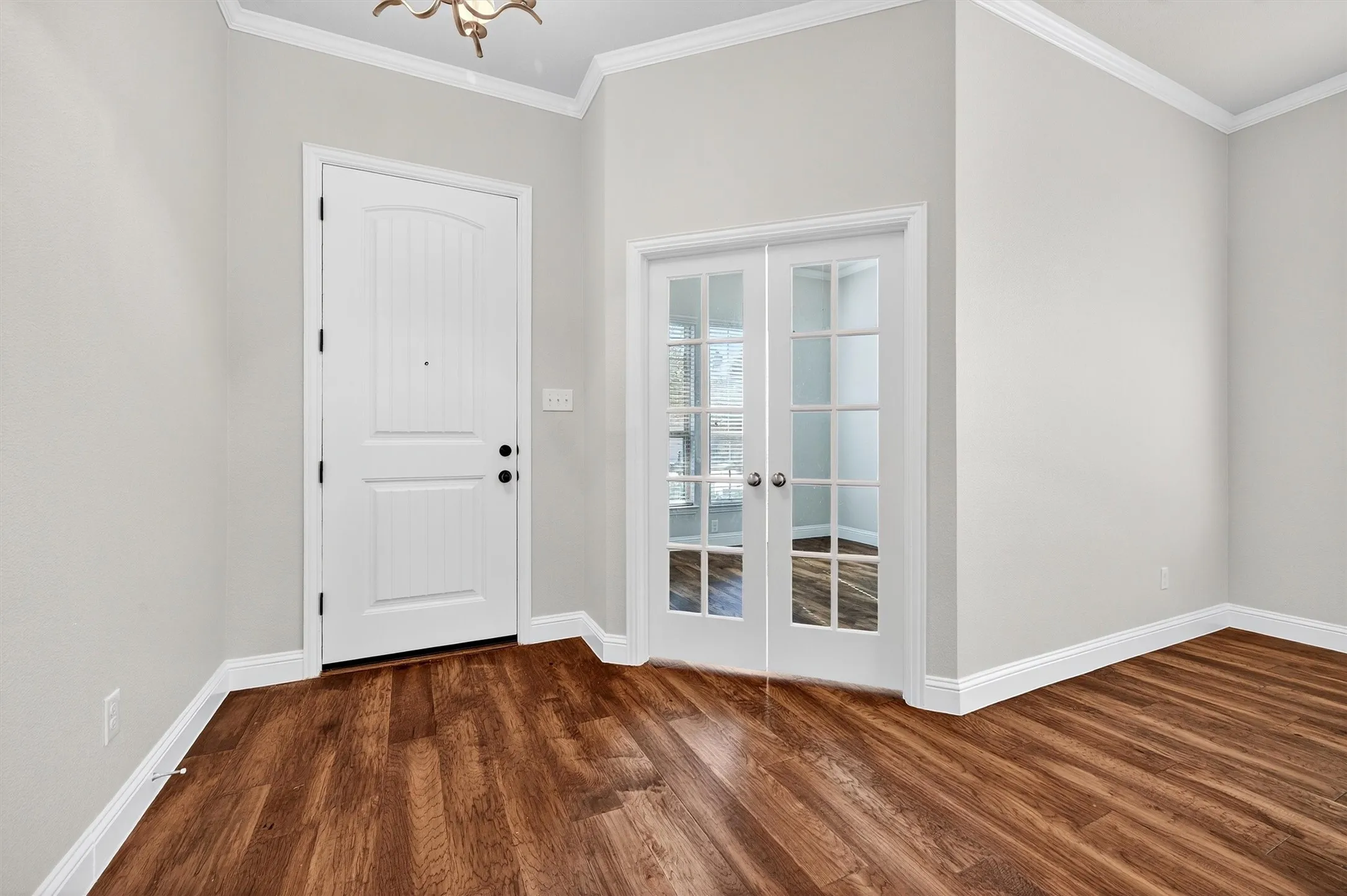 Office entrance has French doors