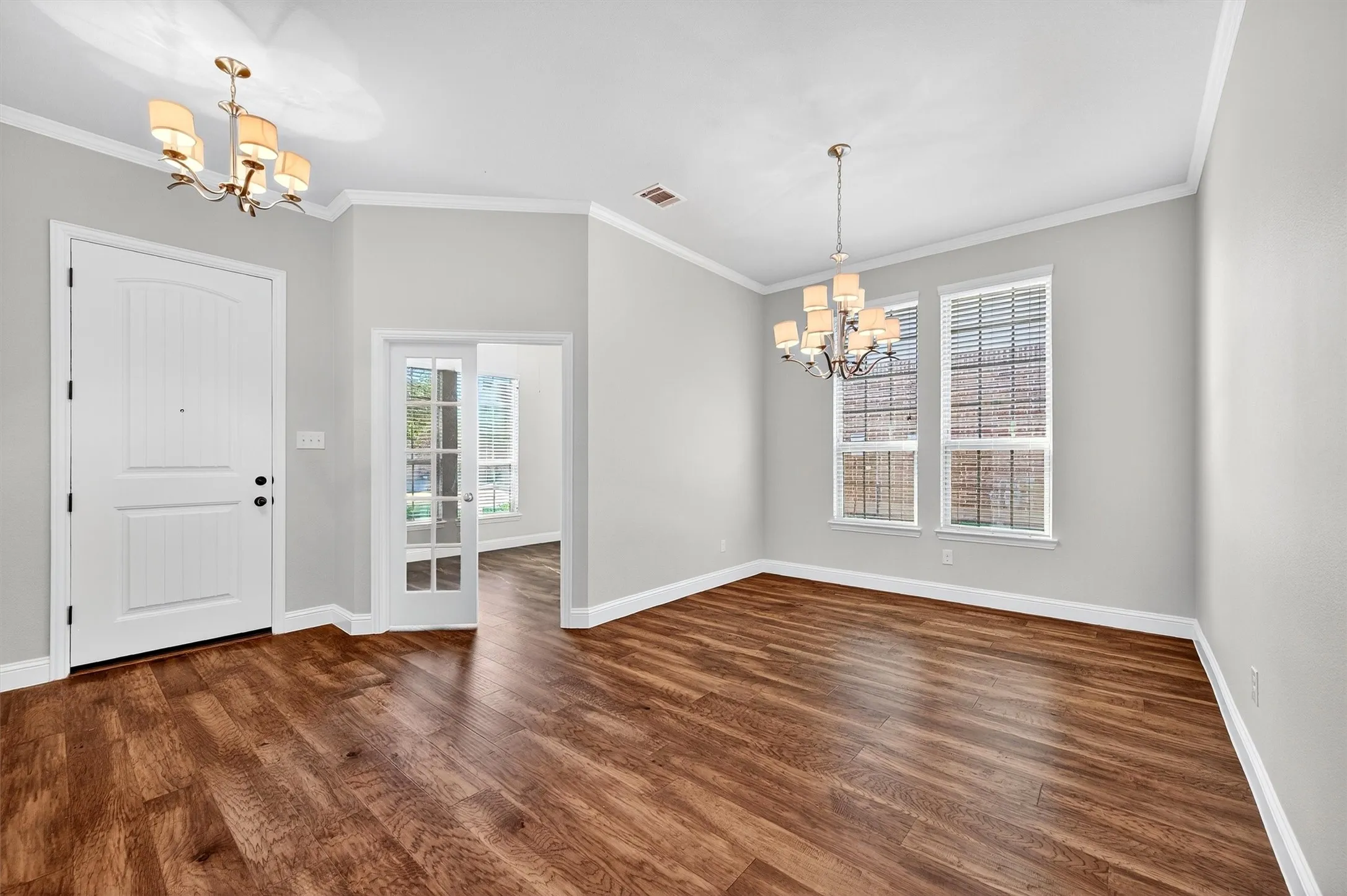Foyer opens into formal dining or optional living area