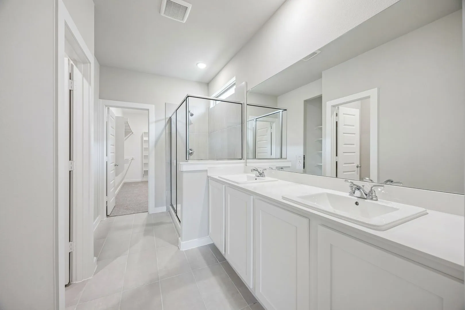 Primary Bathroom in the Willow home plan by Trophy Signature Homes – REPRESENTATIVE PHOTO