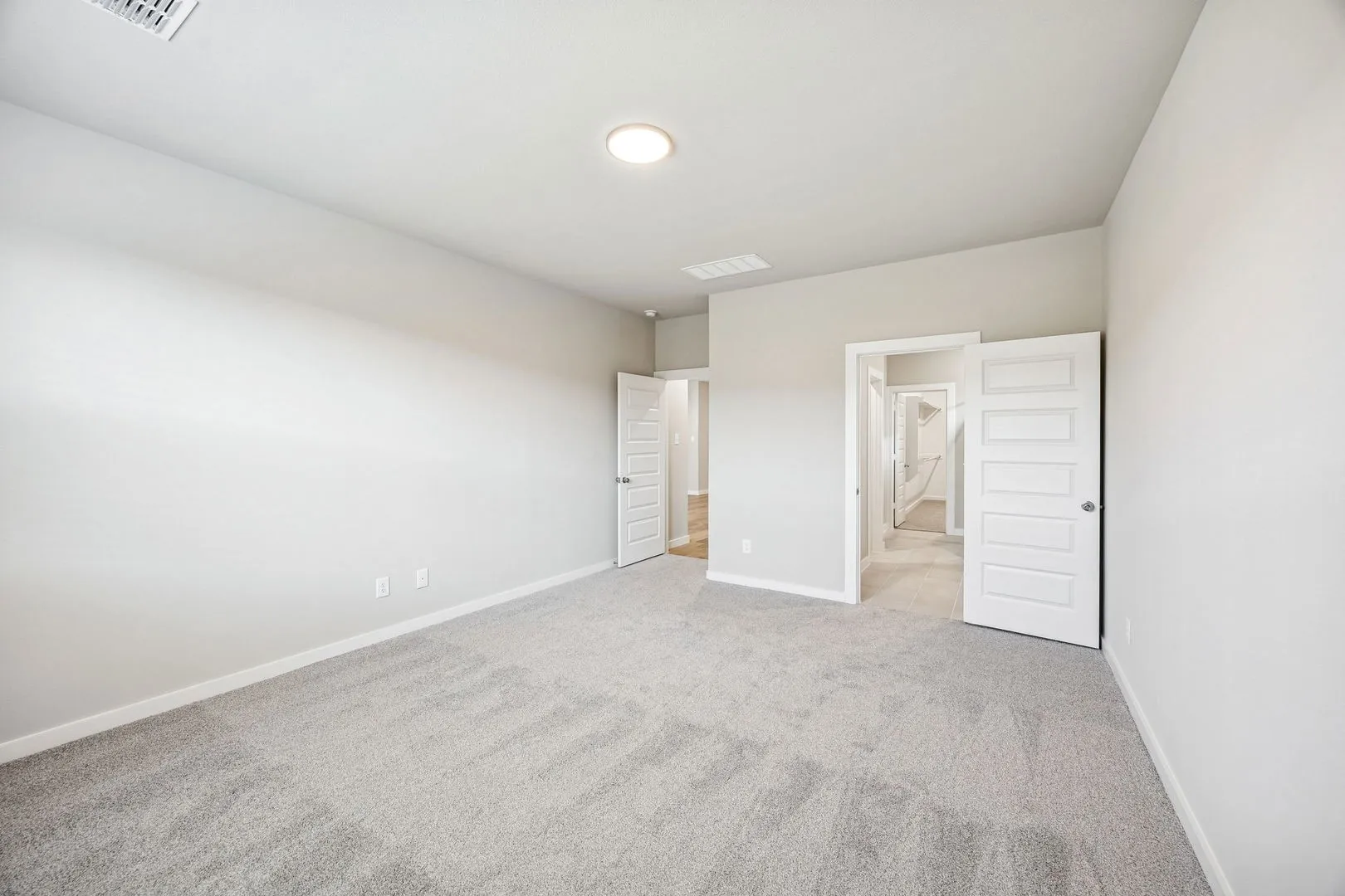 Primary Suite in the Willow home plan by Trophy Signature Homes – REPRESENTATIVE PHOTO