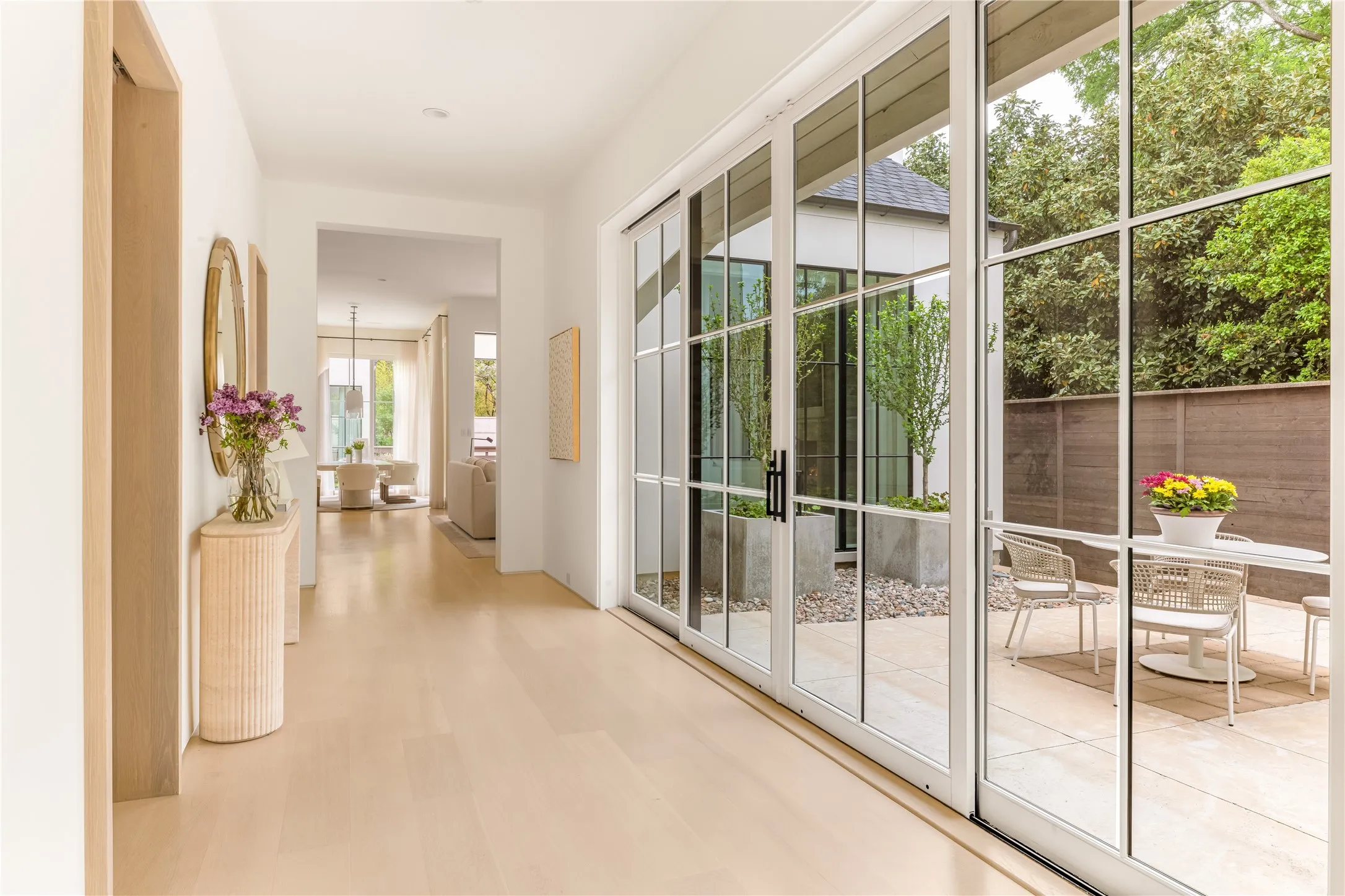 Entry with sliding doors to courtyard
