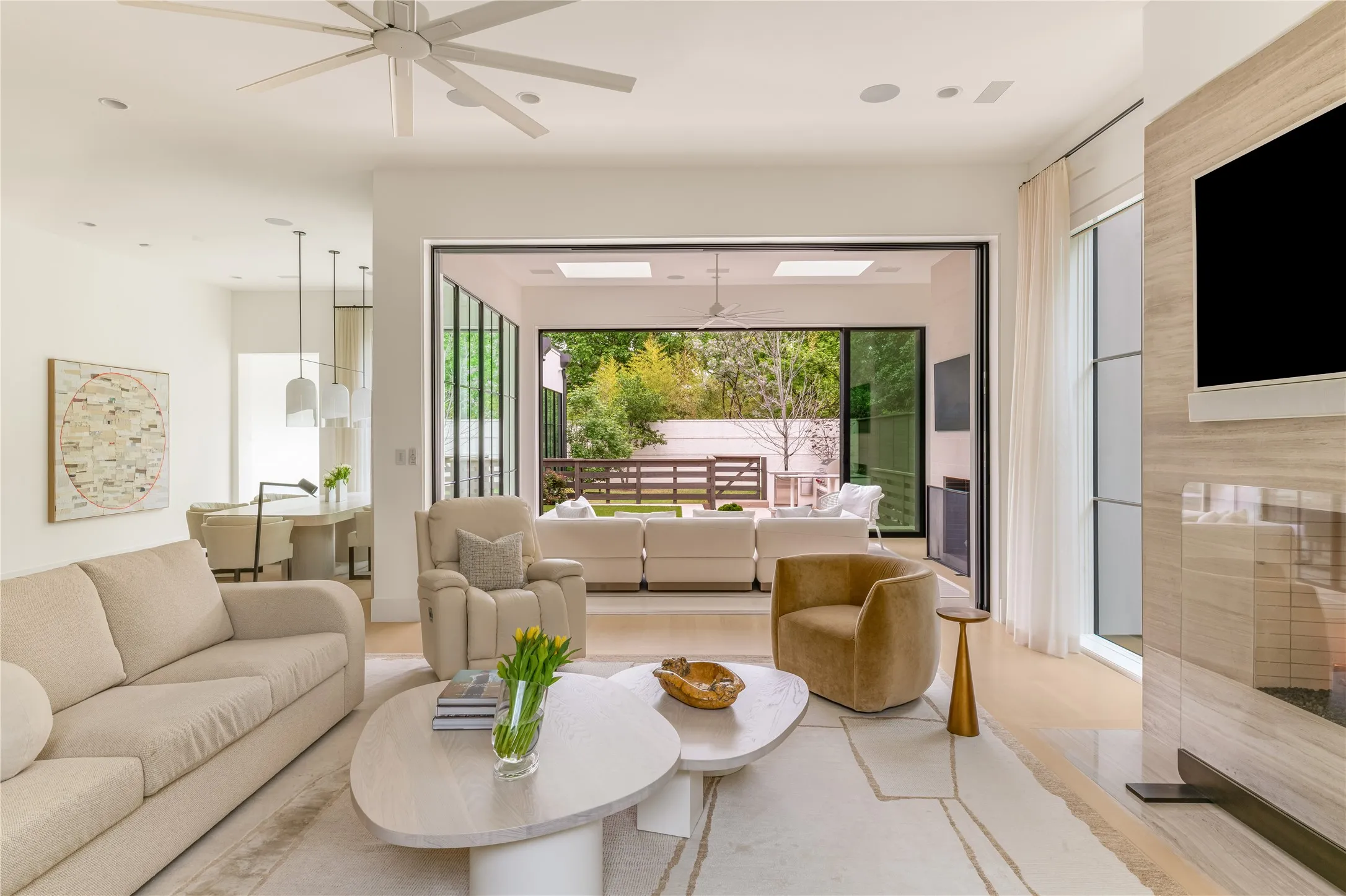Family Room with Isokern gas fireplace and sliding doors to sunroom