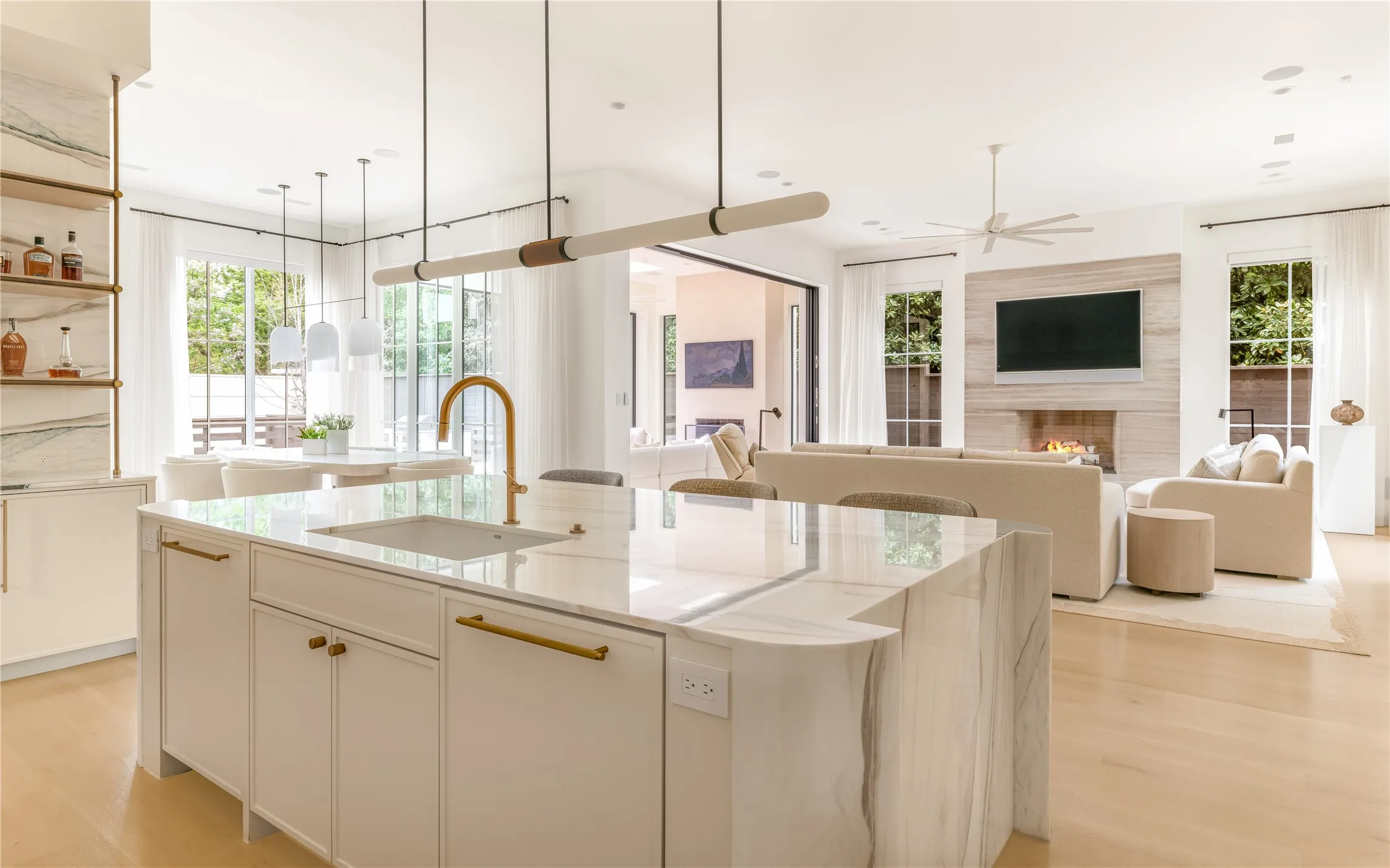 Gourmet kitchen with adjacent family room