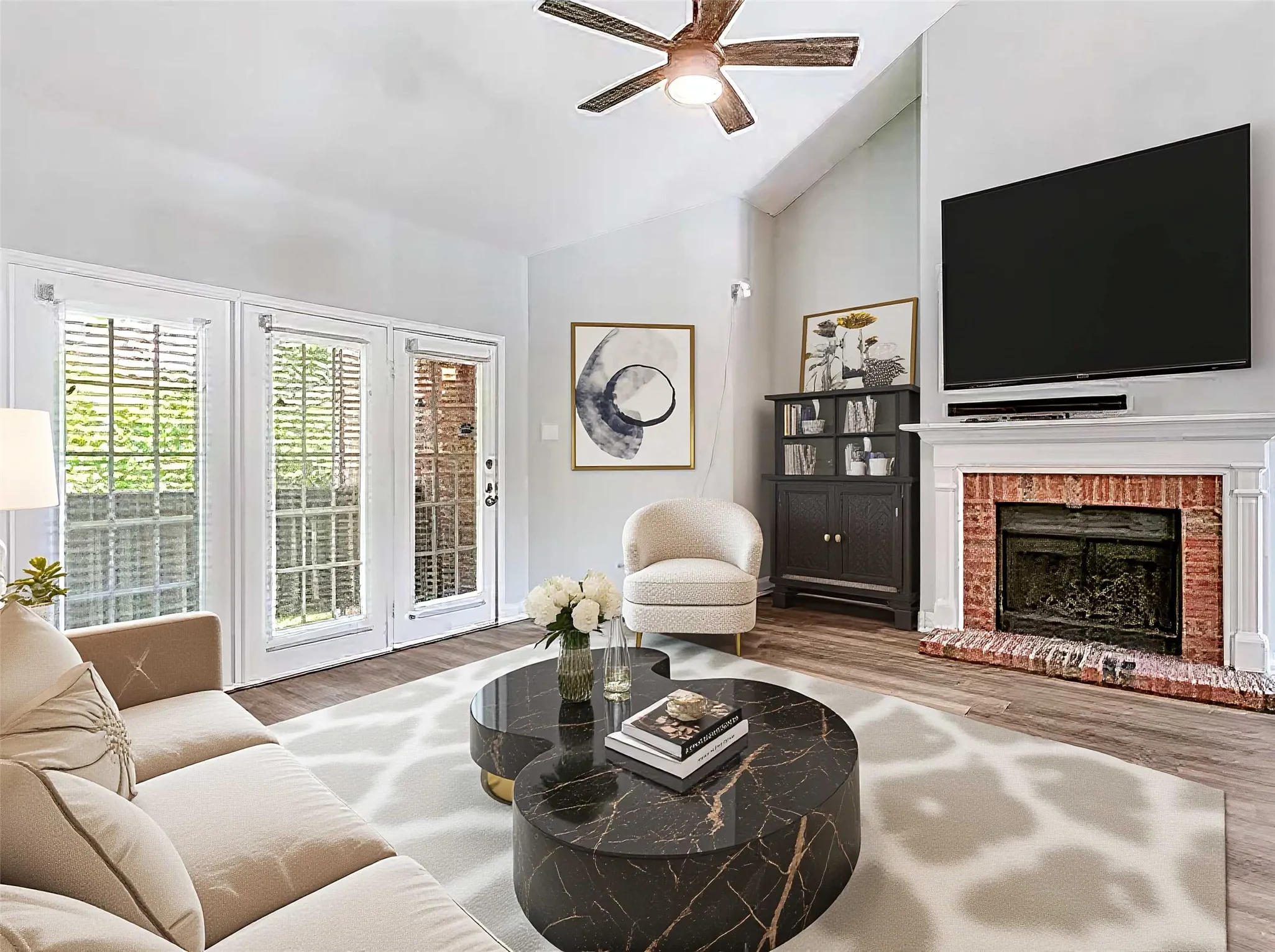 View of Living Room from staircase. TV can remain. (Virtually staged with furniture)