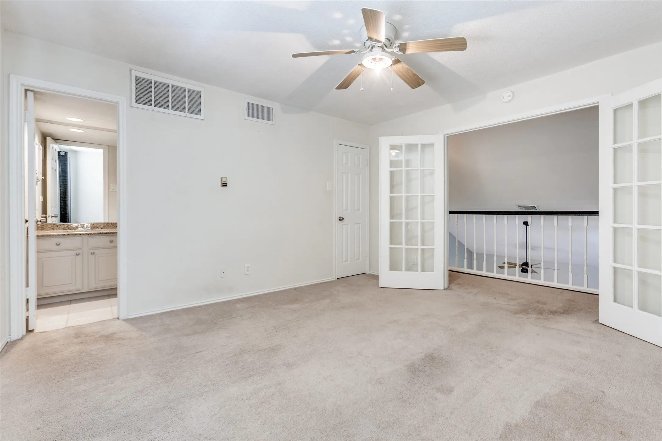 View of secondary bedroom from the southeast corner