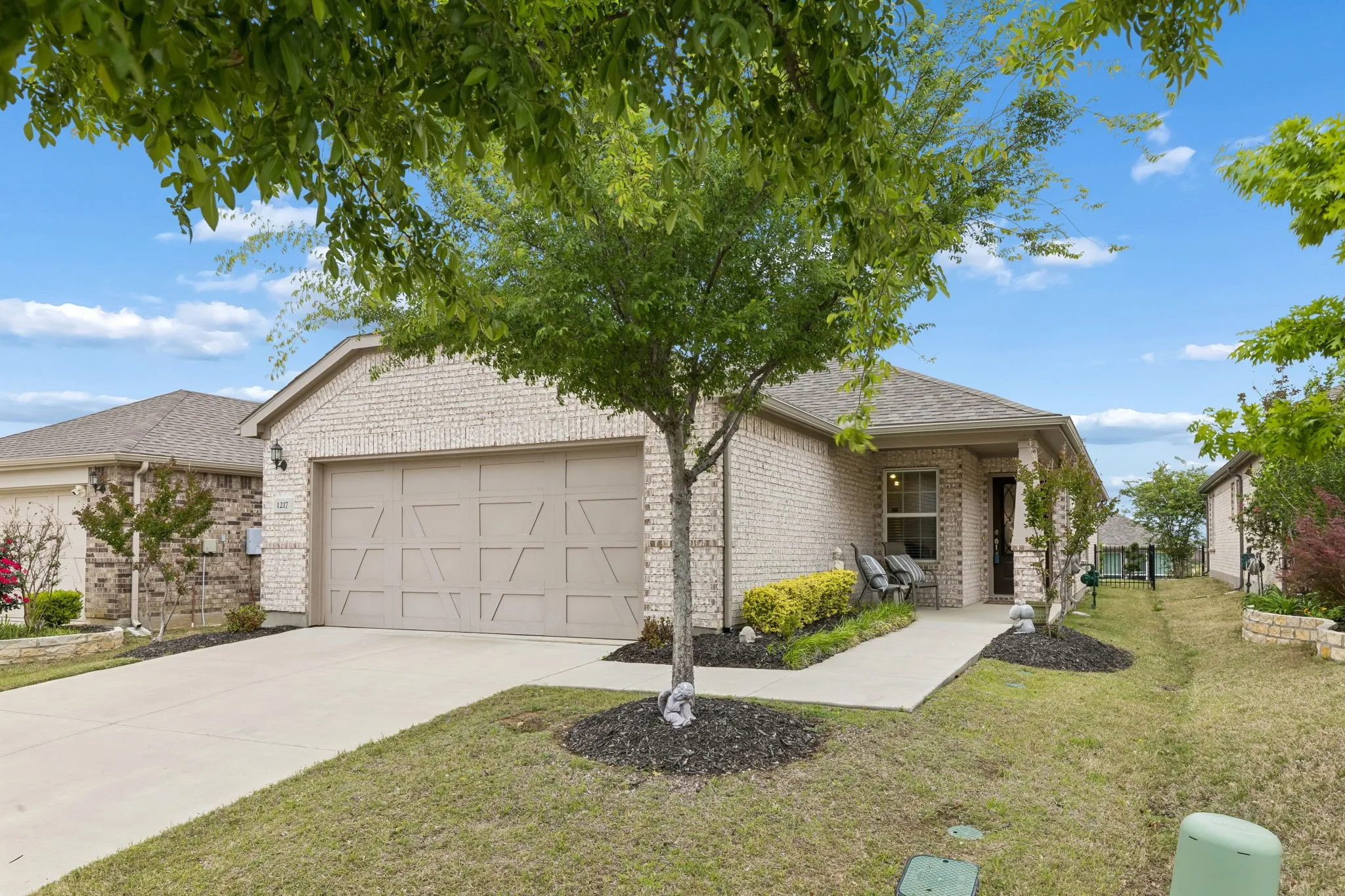 front of home w covered porch.