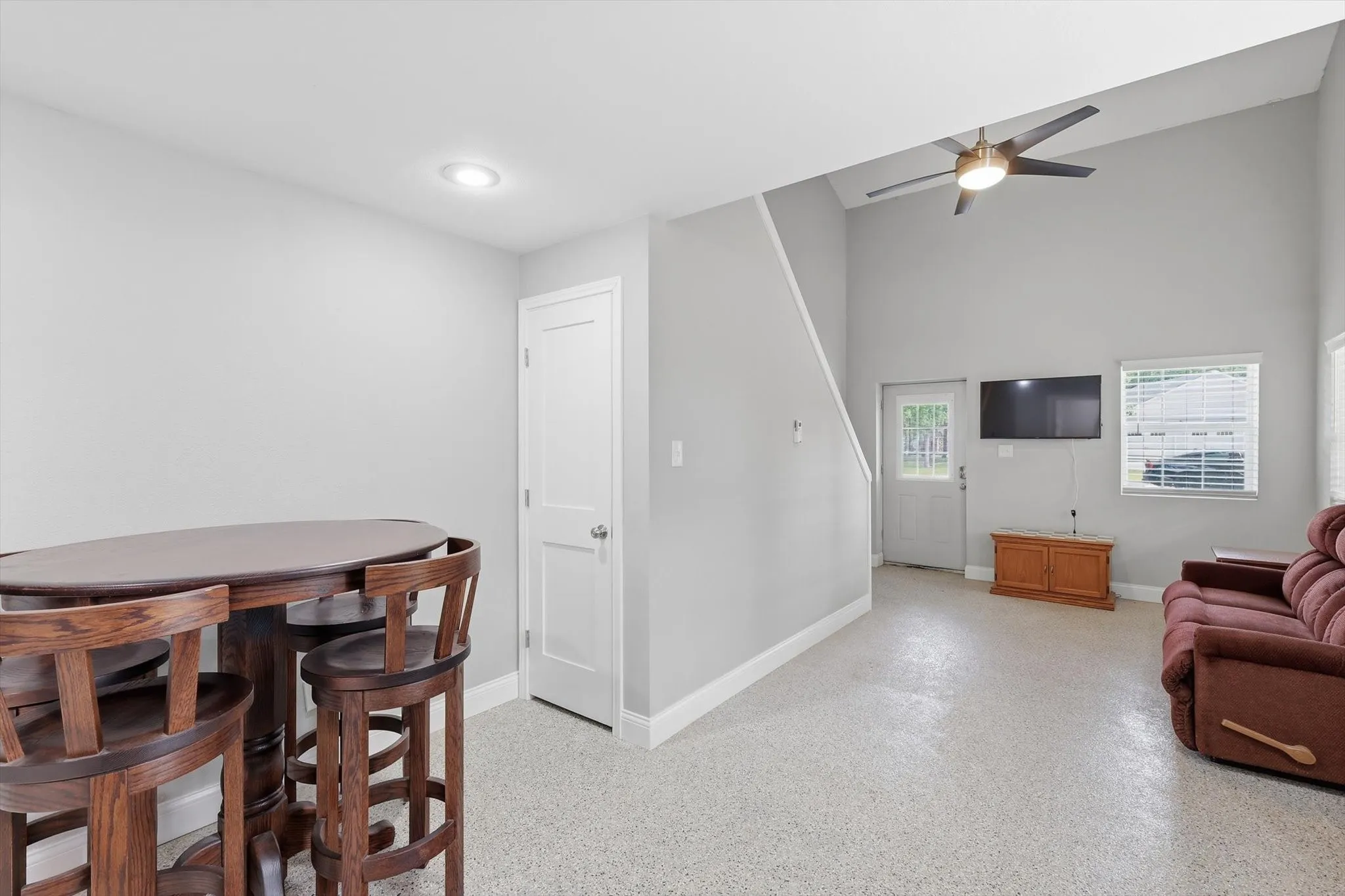 Alternate view of dining space with walk-in under the stair closet