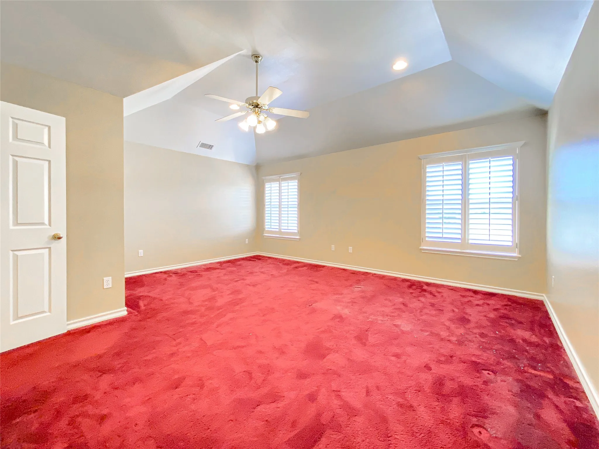 BEDROOM 3 with vaulted ceiling, ceiling fan, and recessed lighting