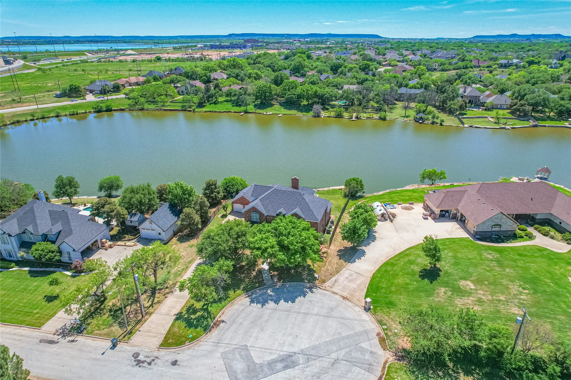 Aerial view of residential area with a nearby body of water