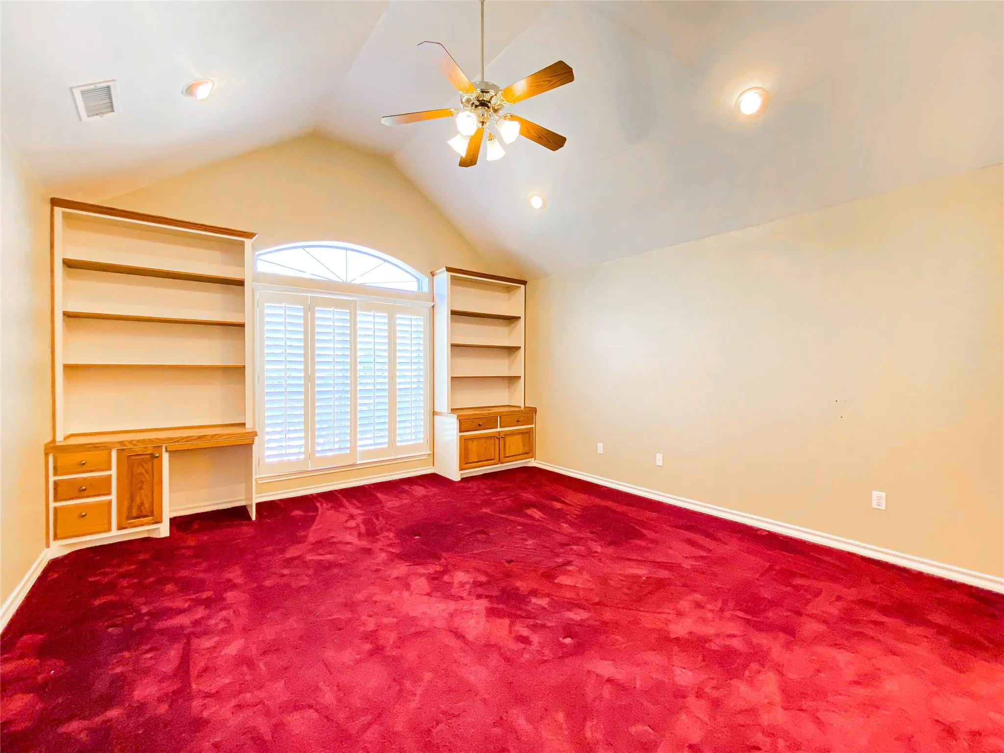 BEDROOM 4 with ceiling fan, built in shelves, dark colored carpet, and recessed lighting
