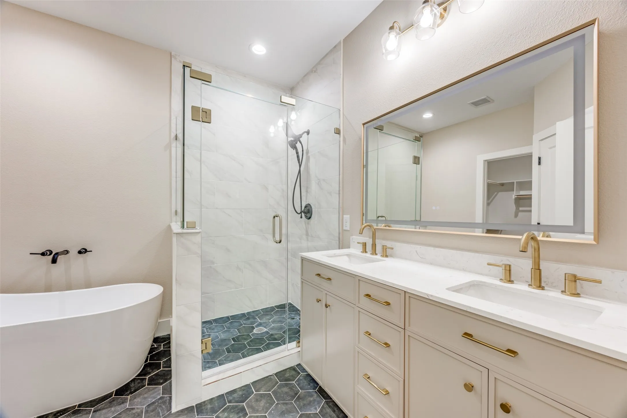 Primary Bath with shower and freestanding soaking tub
