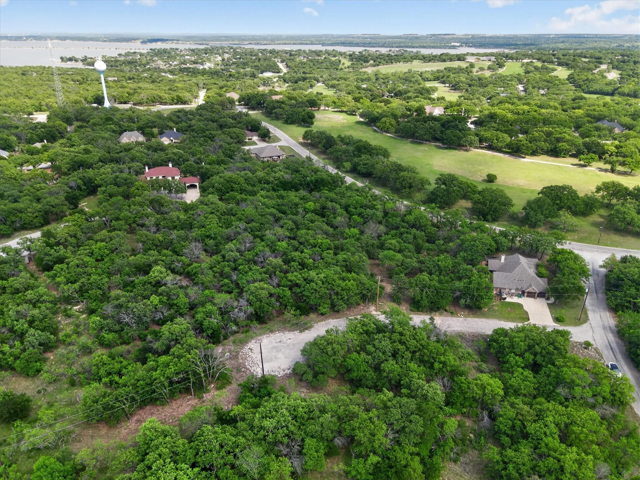 Unimproved Land For Sale in Wise County , 106 Ash Court, Runaway Bay, Texas 76426, 0, 0, Garage spaces, 0 Sqft, built in 0, mls#21232088, Real Estate Agent in Runaway Bay, Homes For Sale in Wise county, Homes For Sale in Runaway Bay, Realtor in Runaway Bay Texas, Real Estate Brokerage Independent Realty Texas, Luminita Cordes Realtor