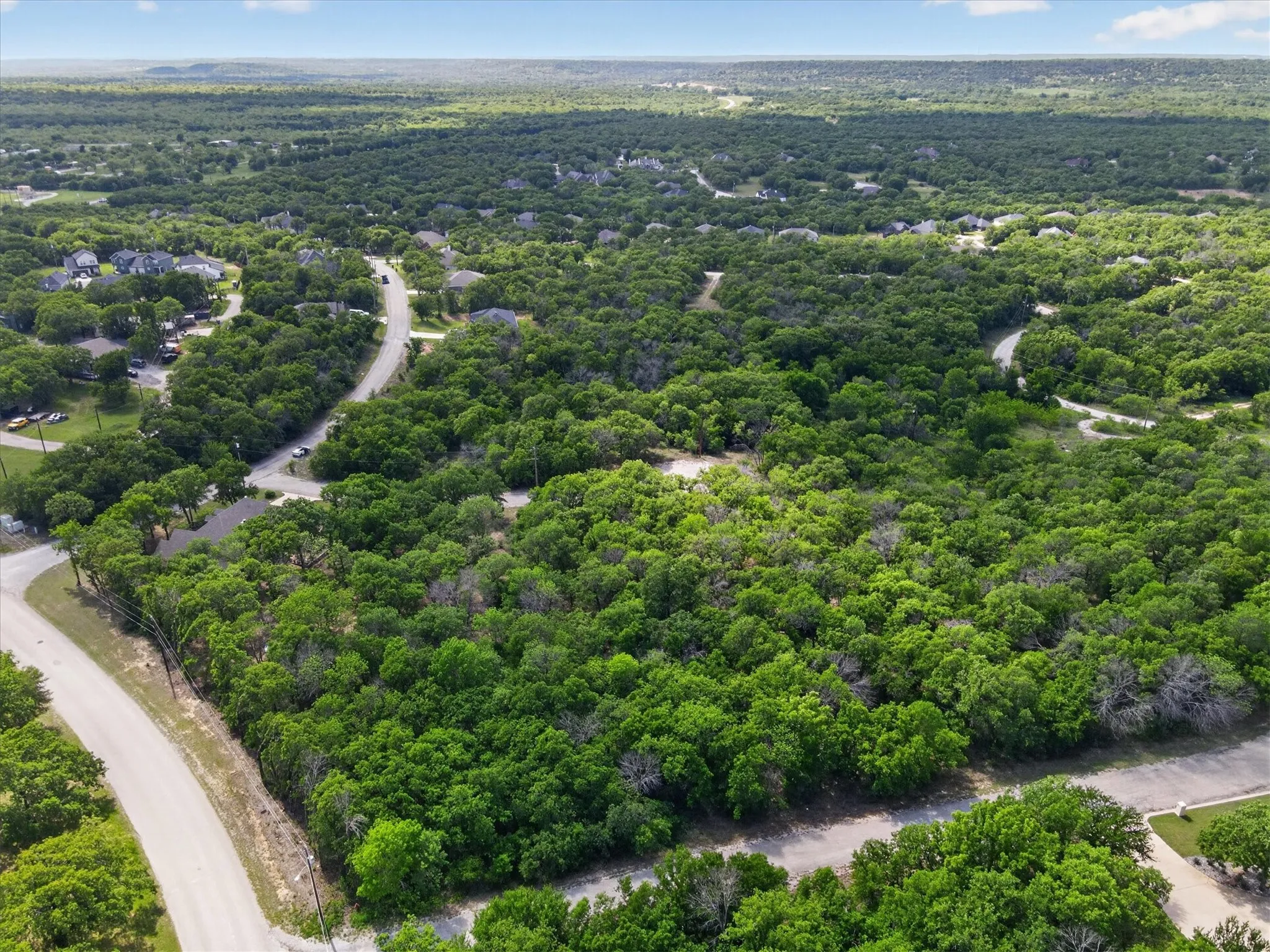 Unimproved Land For Sale in Wise County , 106 Ash Court, Runaway Bay, Texas 76426, 0, 0, Garage spaces, 0 Sqft, built in 0, mls#21232088, Real Estate Agent in Runaway Bay, Homes For Sale in Wise county, Homes For Sale in Runaway Bay, Realtor in Runaway Bay Texas, Real Estate Brokerage Independent Realty Texas, Luminita Cordes Realtor