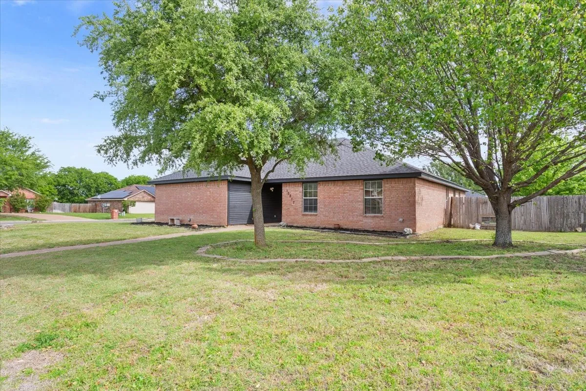 View of front of property with brick siding