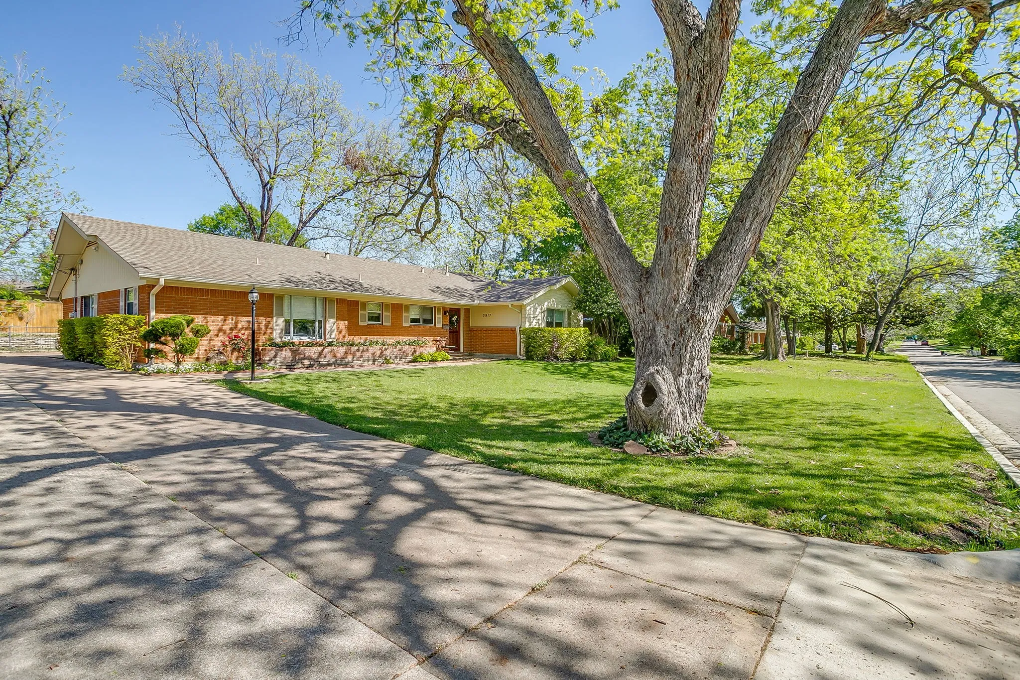 Quiet, tree lined street in well established neighborhood!