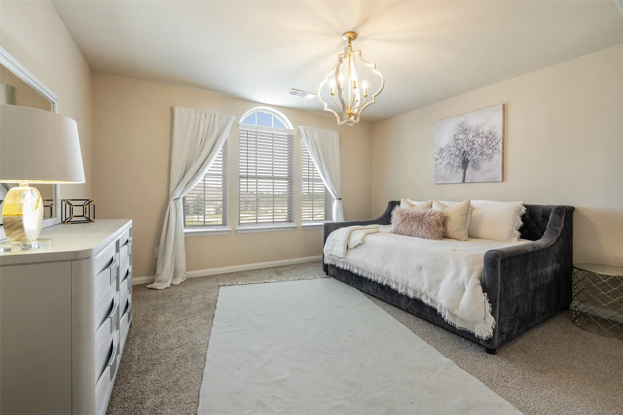 Secondary bedroom with ensuite bathroom and walk-in closet! Could be used as a secondary master bedroom.