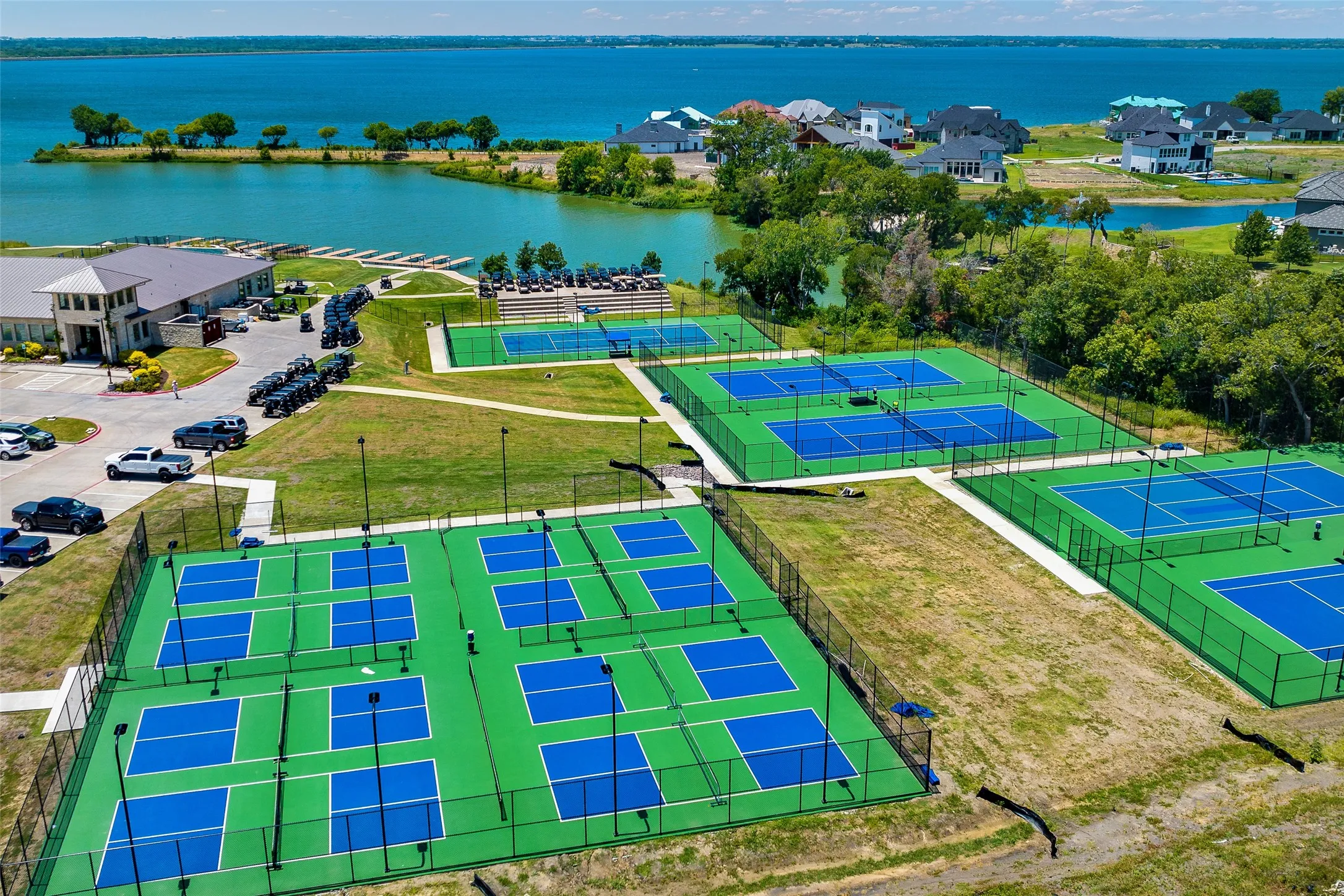 The HG&Y HOA includes a restaurant/bar, community pool, fitness center, pickleball, tennis, sand volleyball, golf pro shop, and golf course (additional membership).