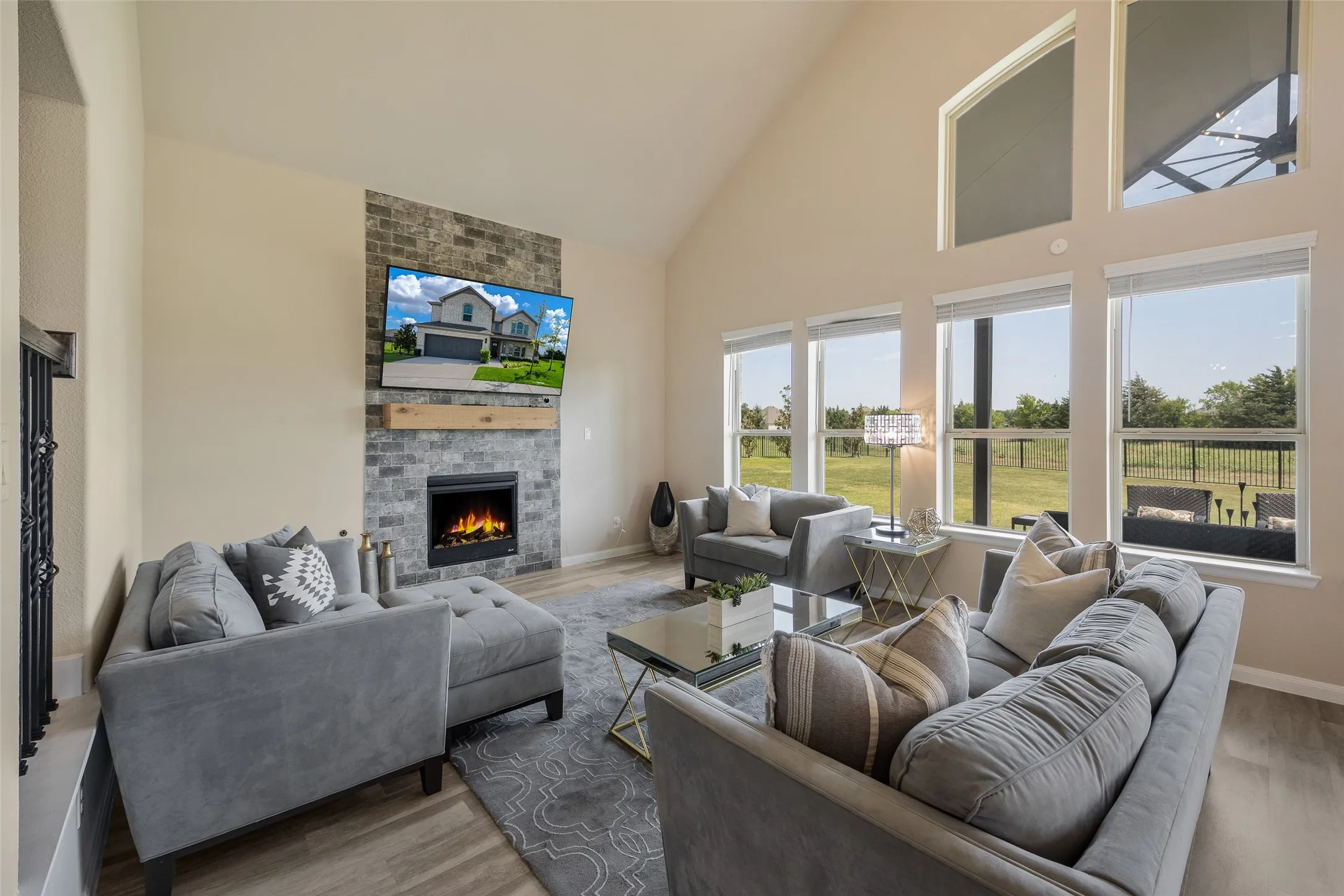 Cozy living room with gas fireplace and lots of natural light!