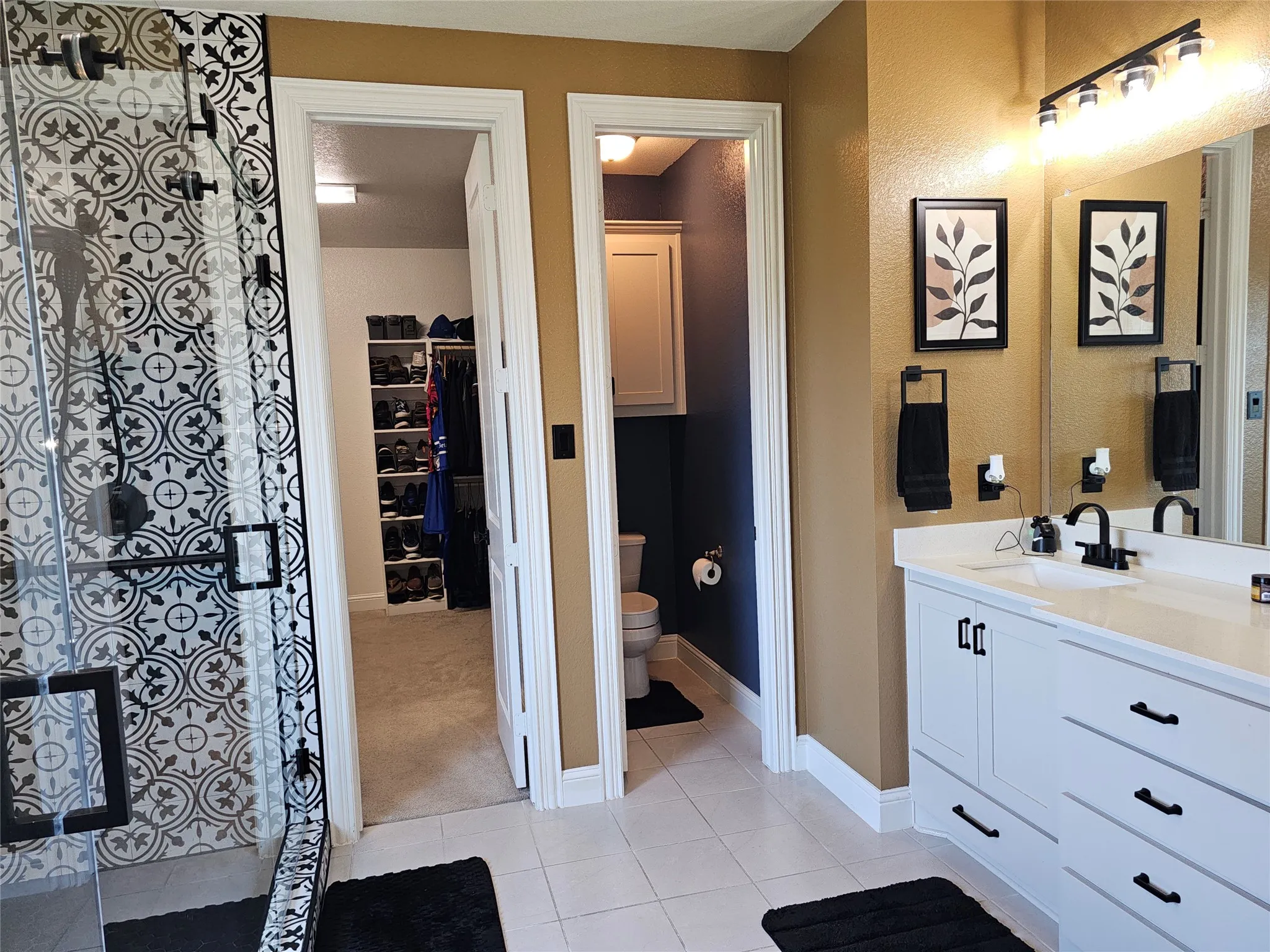 Primary Bathroom with Dual Vanities & Walk-in-Closet Access