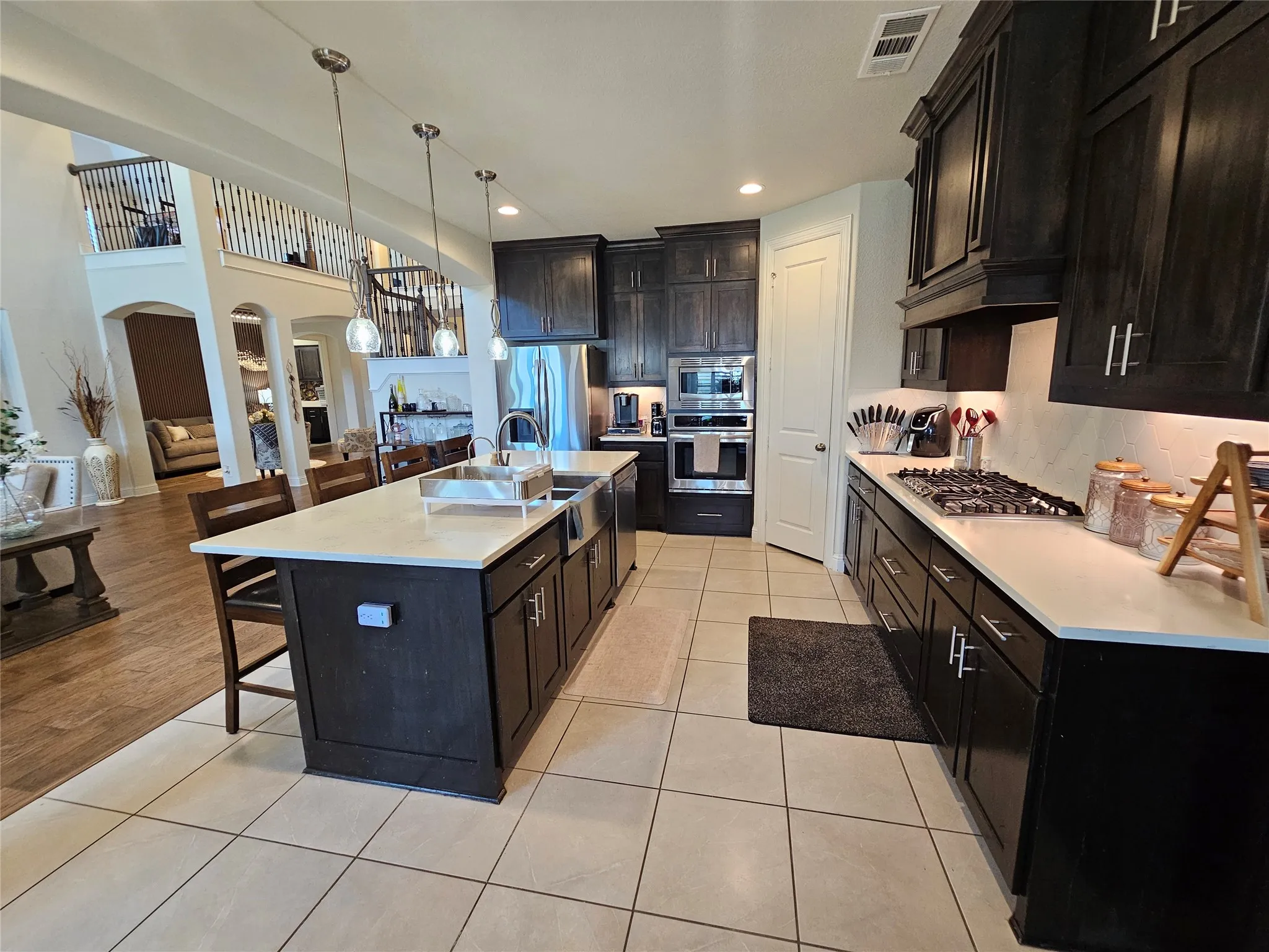 Chef's Kitchen with Oversized Island & Pendant Lighting