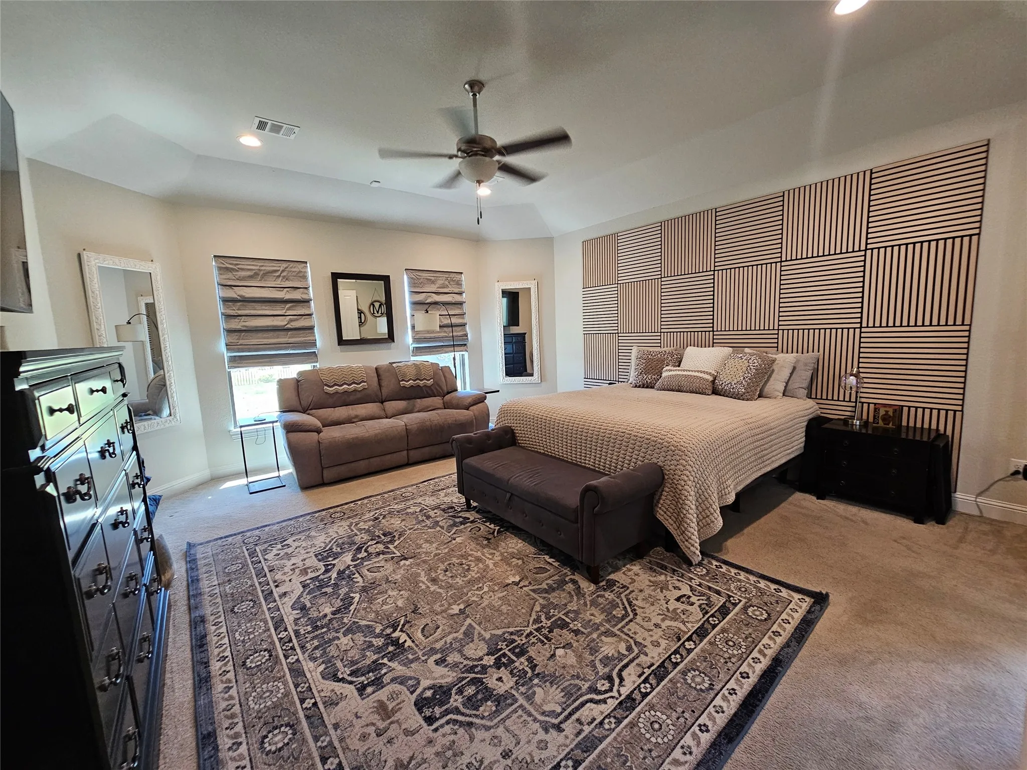 Spacious Primary Suite with Custom Accent Wall