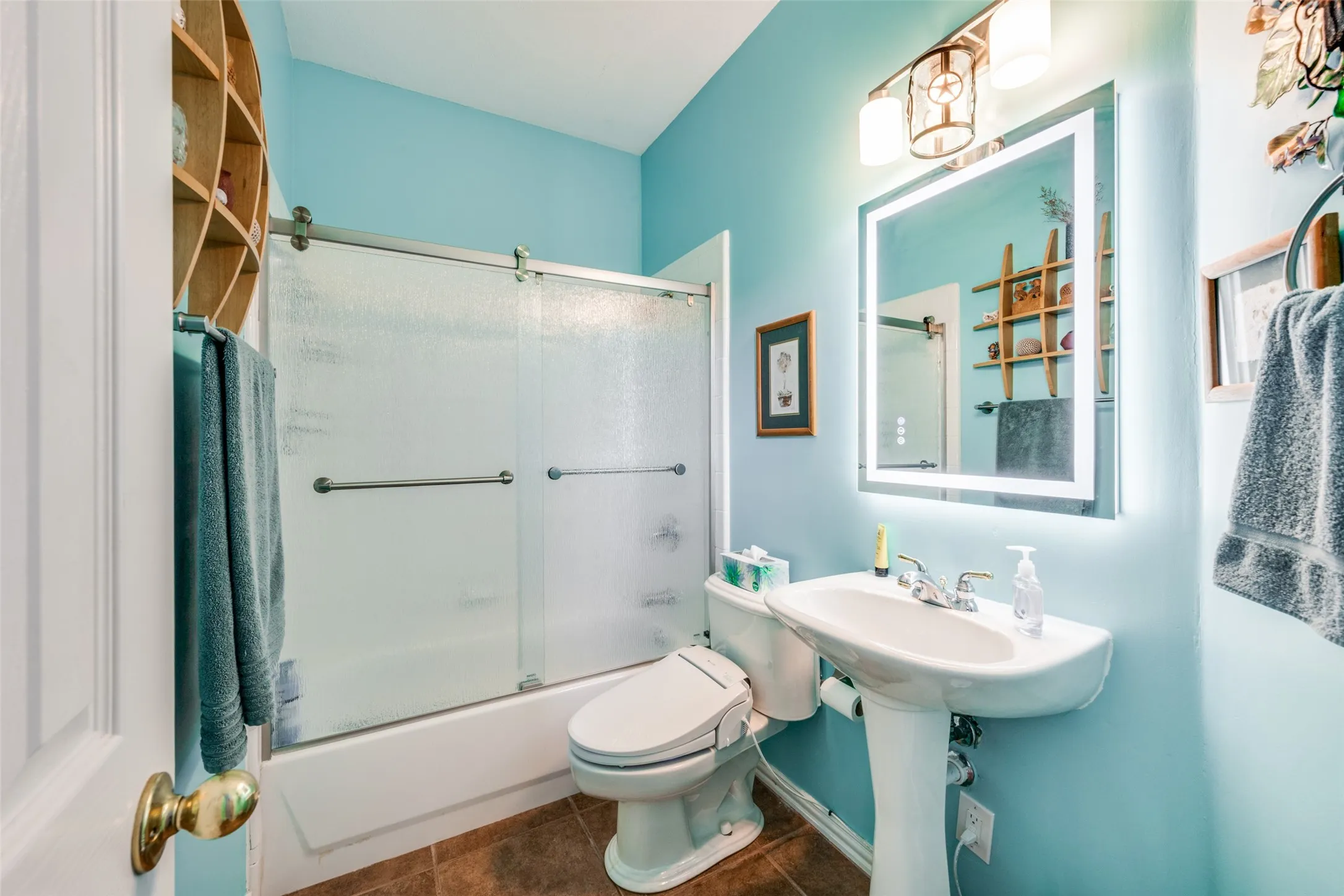 This home offers four full bathrooms.  One for each room and one being a walk through that provides for two of the five bedrooms!
