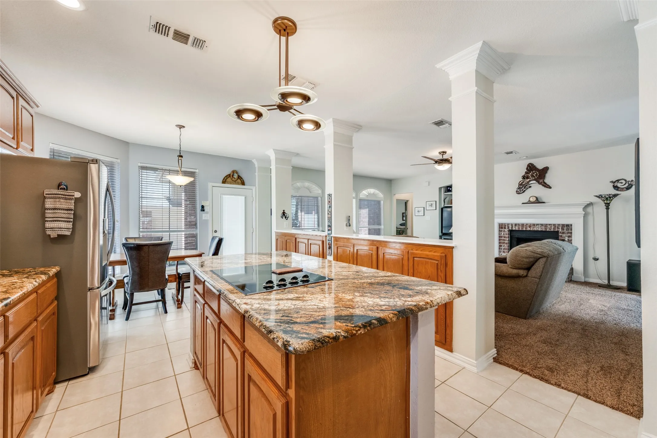 Second bar for serving with full cabinets.  Easy access to patio grilling area and formal dining just off butlers pantry!
