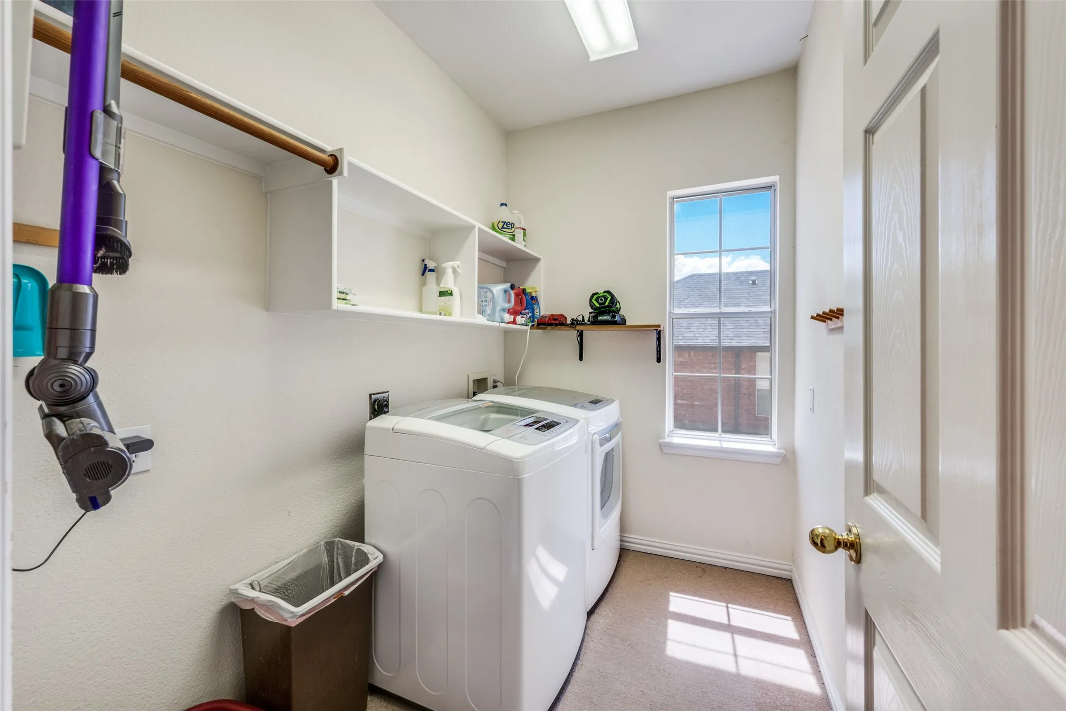 Laundry room on main floor has ample storage!