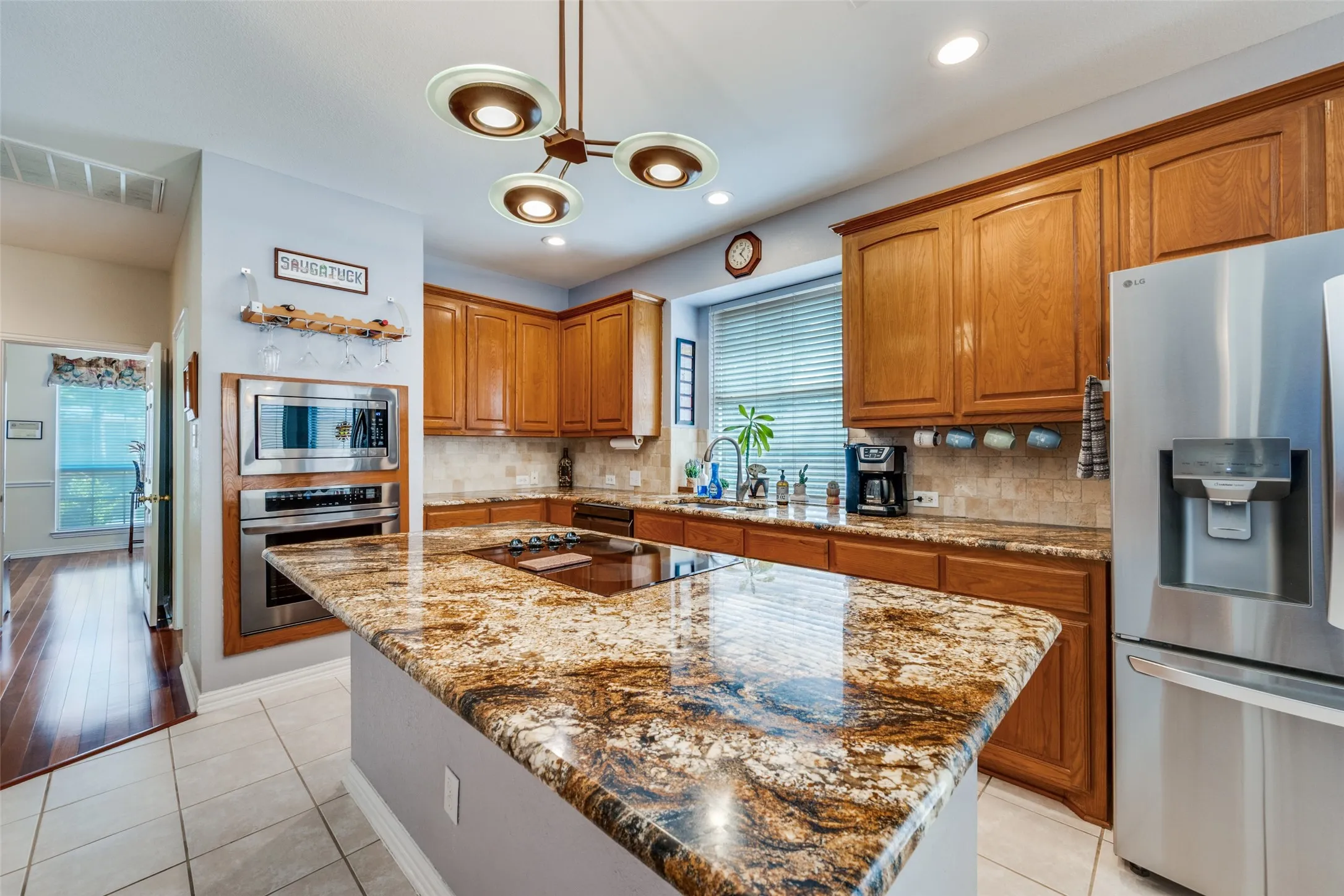 Impressive and spacious kitchen with butlers pantry offering more storage and counter top space! Open, light and ready to entertain!