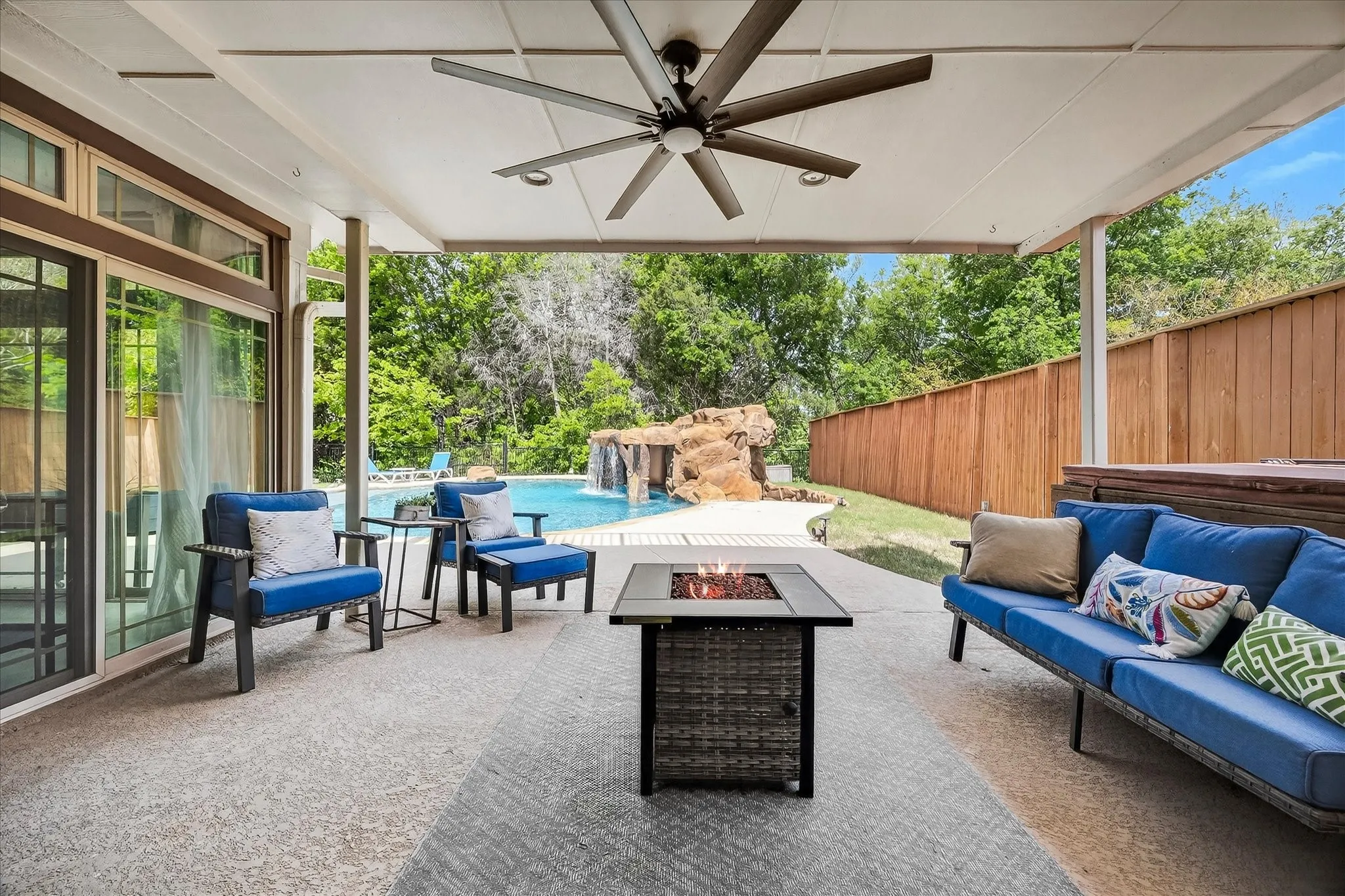 Gorgeous outdoor living area overlooks pool