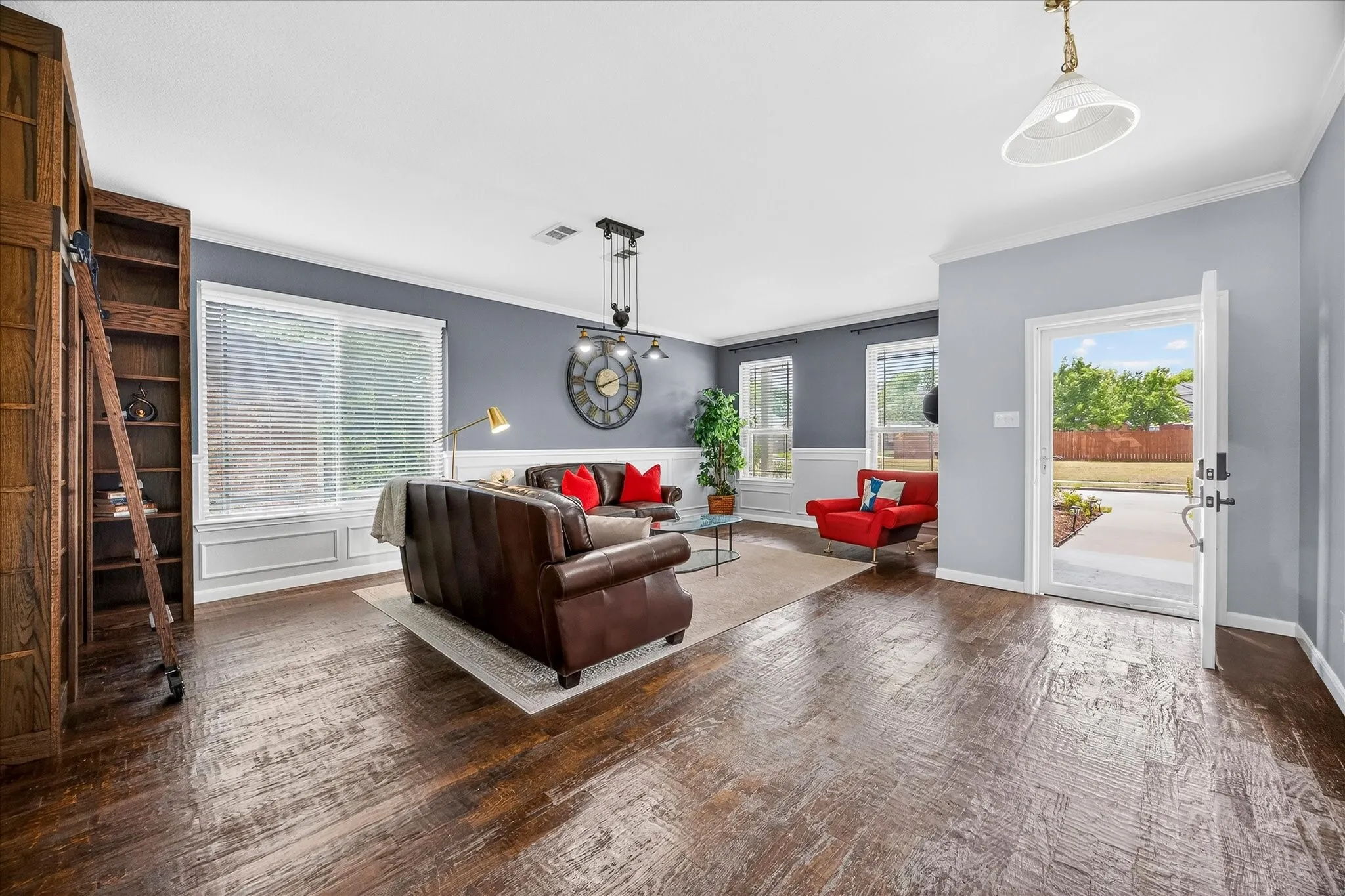 Handscrapped hardwood floors adorn this gorgeous home.