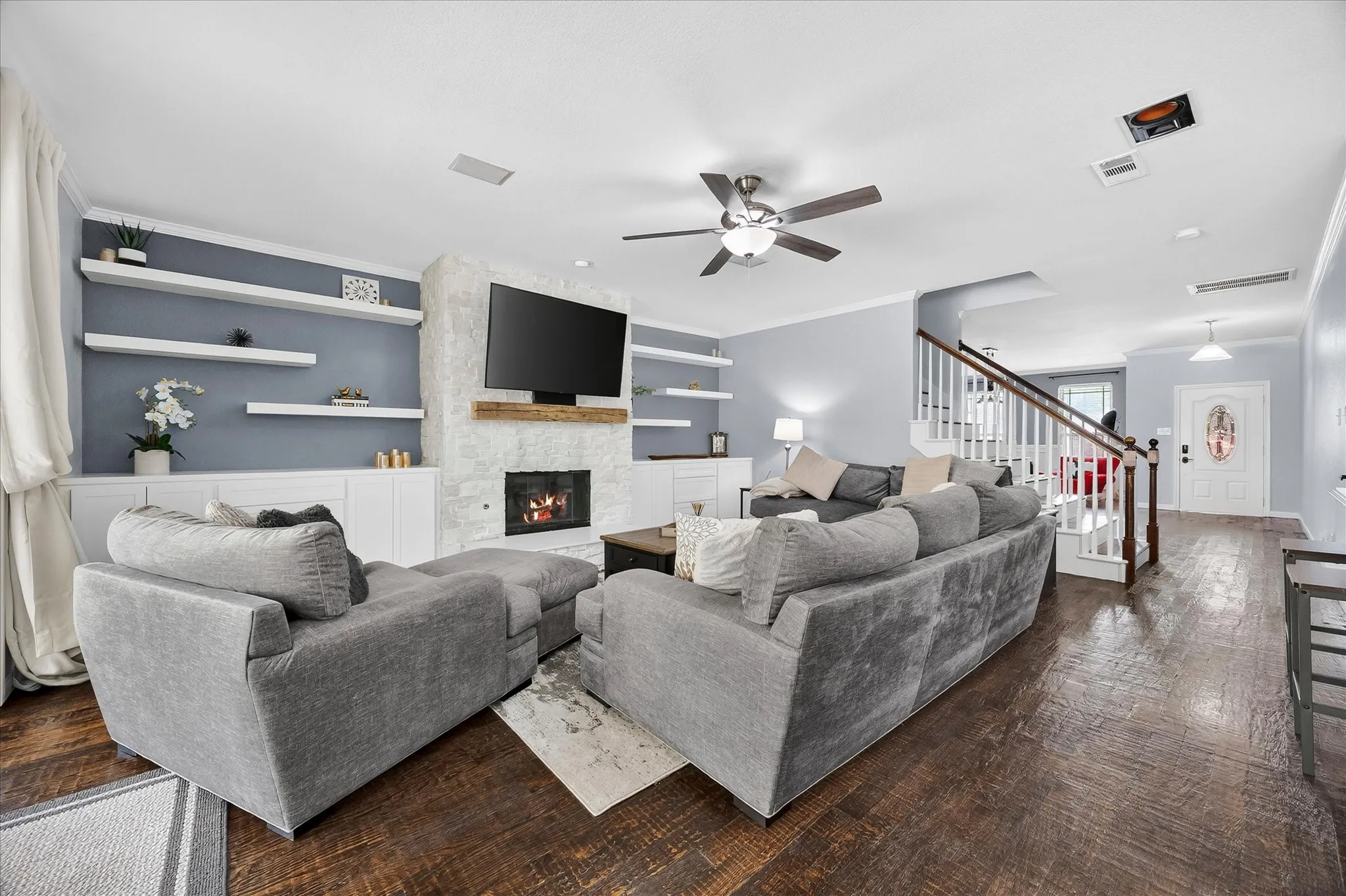Stunning family room opens onto kitchen and dining area