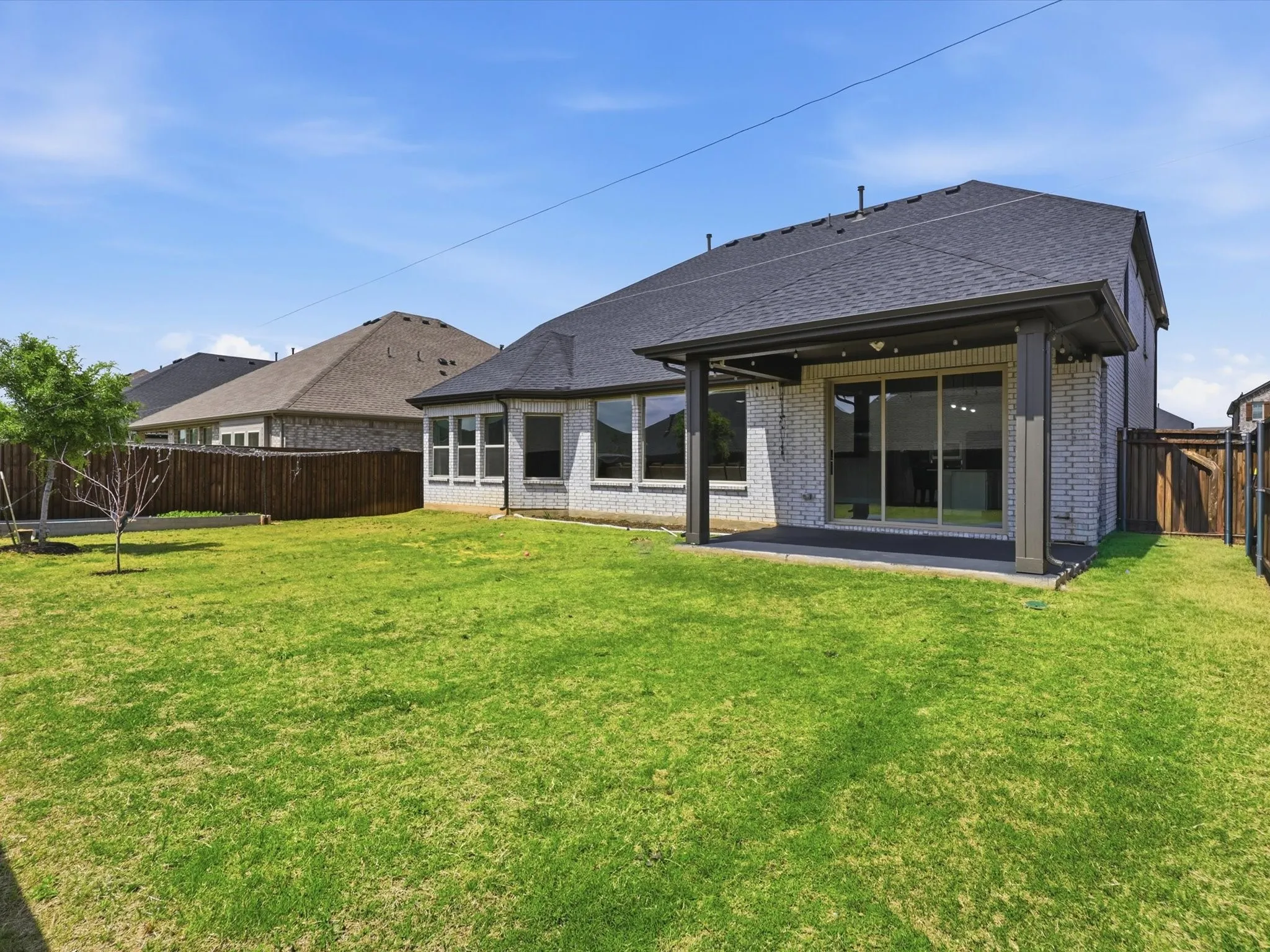 Covered patio perfect for relaxing or hosting guests