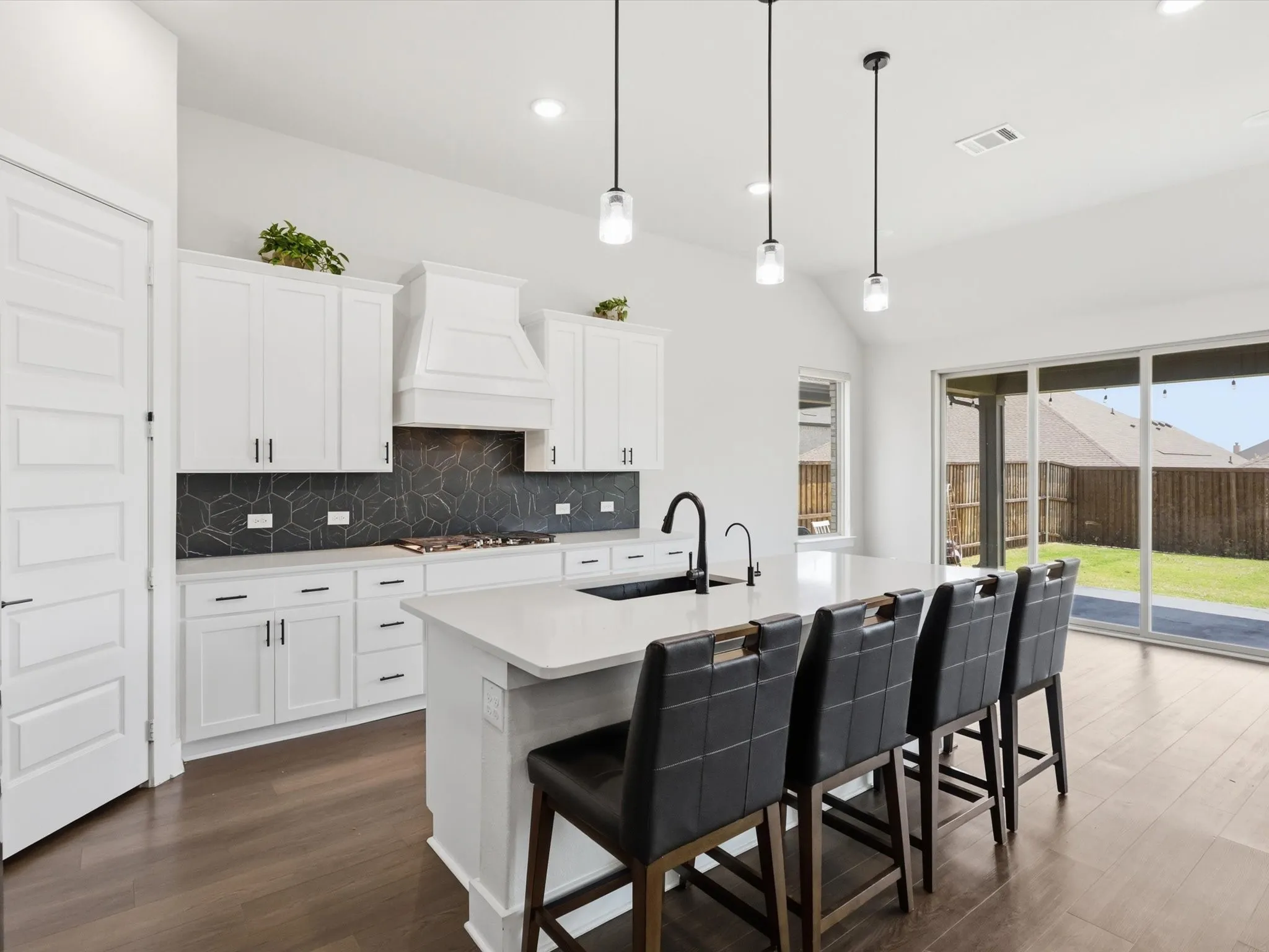 Kitchen and living combo showcasing ideal entertaining layout