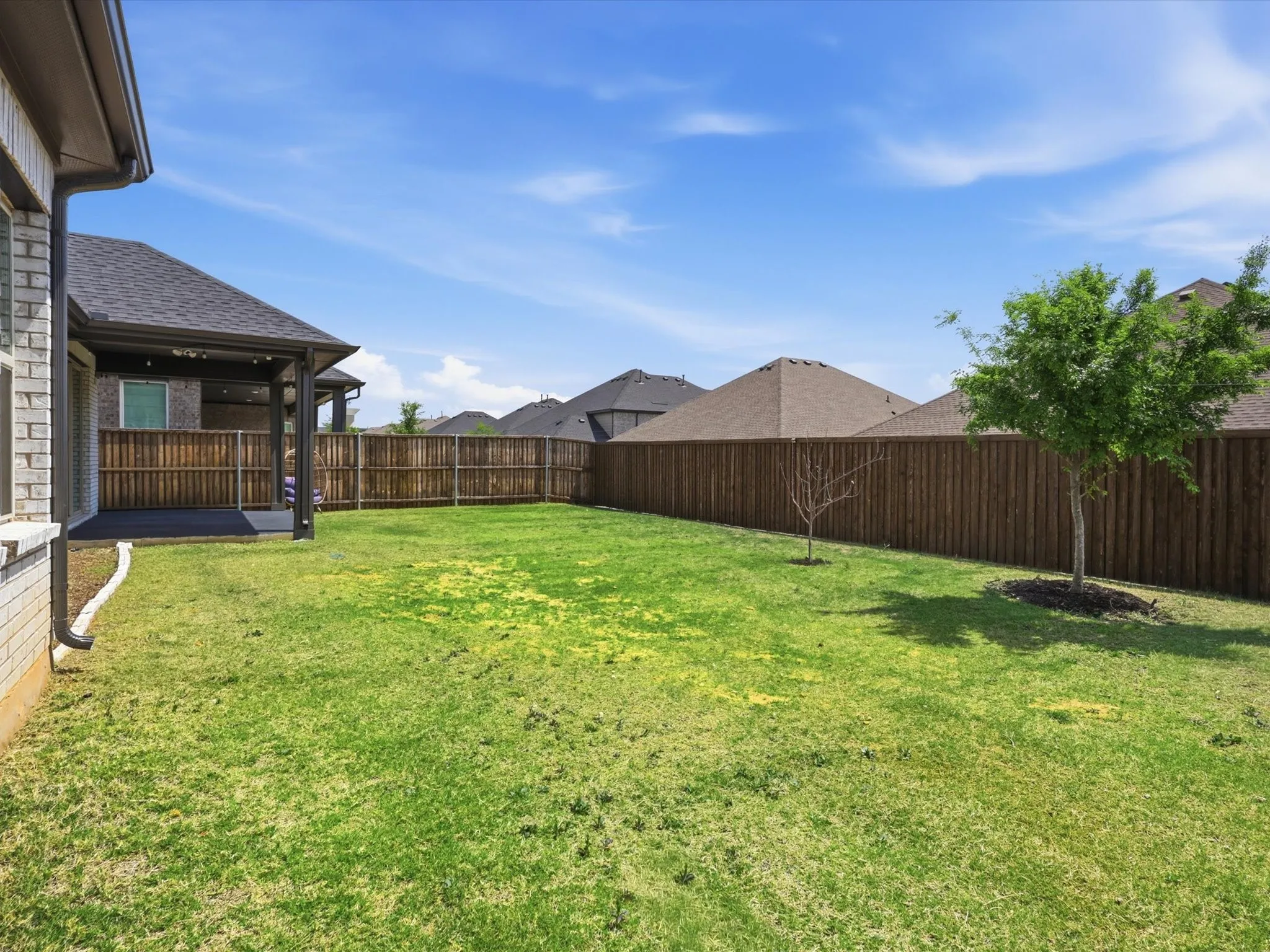 Backyard with plenty of space for outdoor living and play