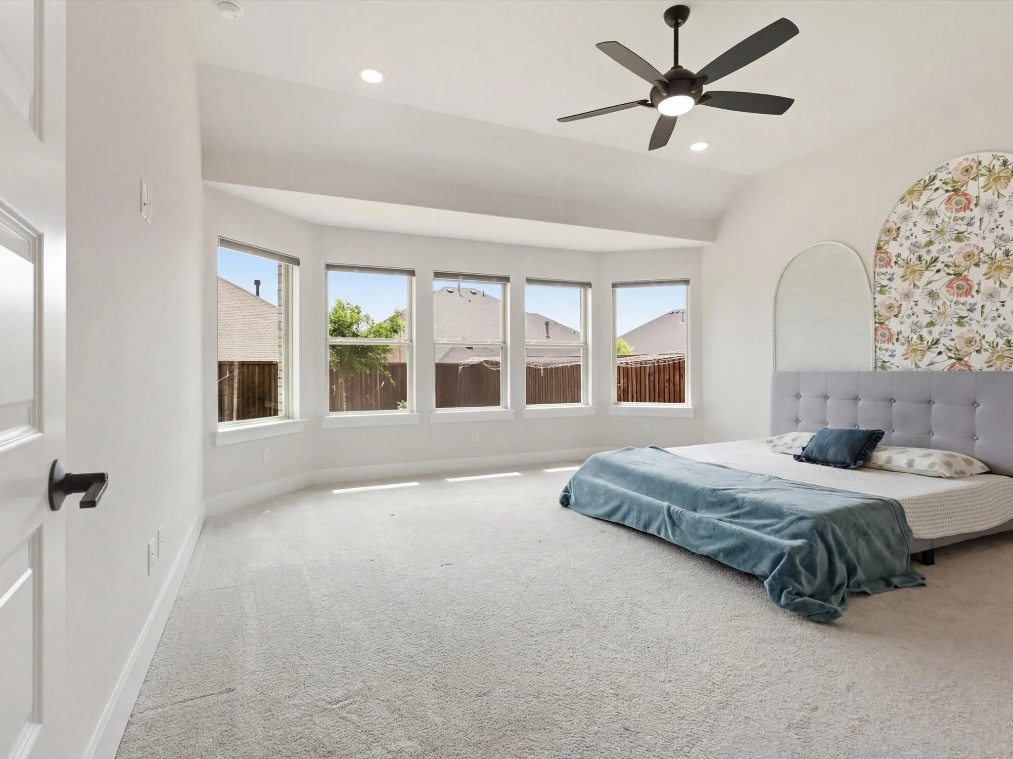 Extended primary suite with bay windows