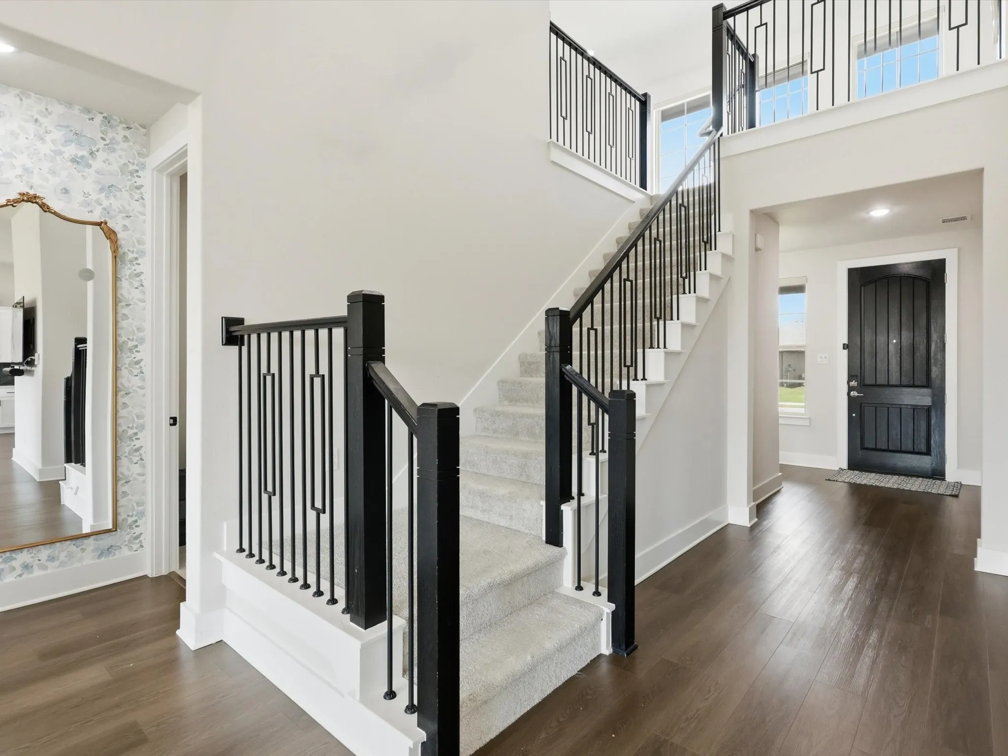 Welcoming entryway with clean lines and wood flooring