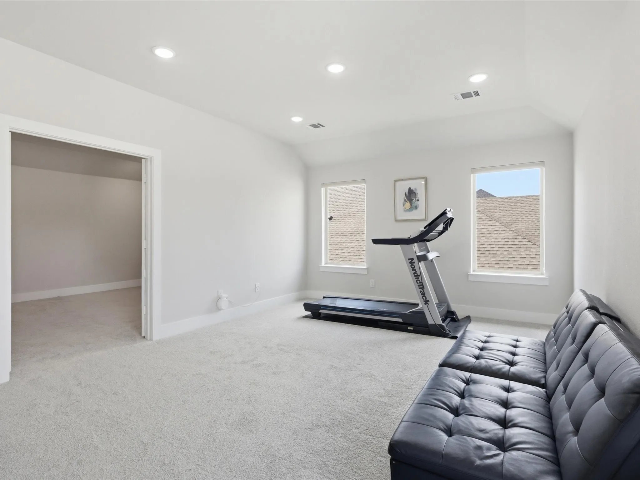 Flexible upstairs space ideal for game room, gym, or media