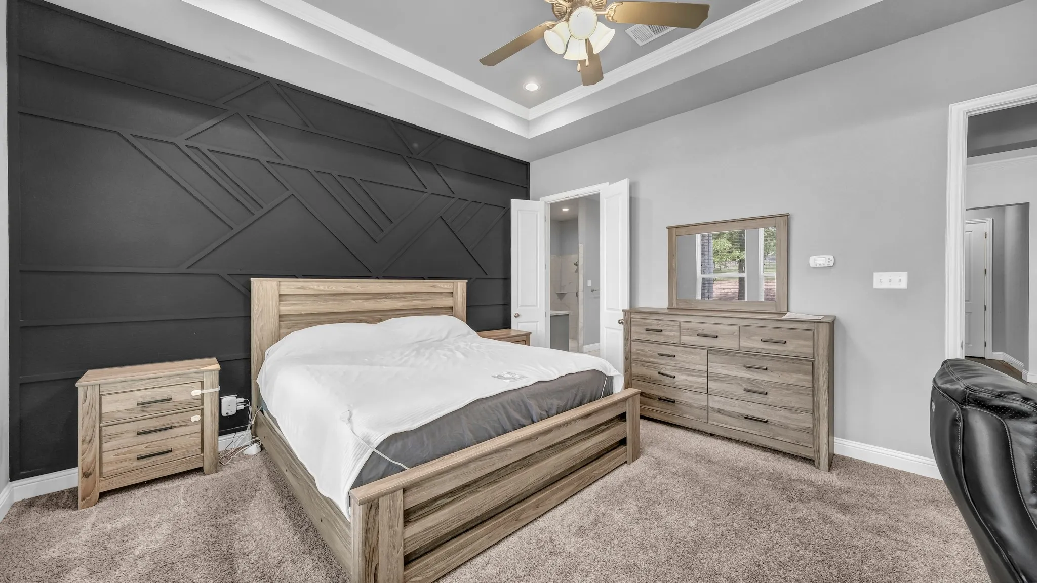Bedroom featuring carpet floors, an accent wall, ceiling fan, and recessed lighting