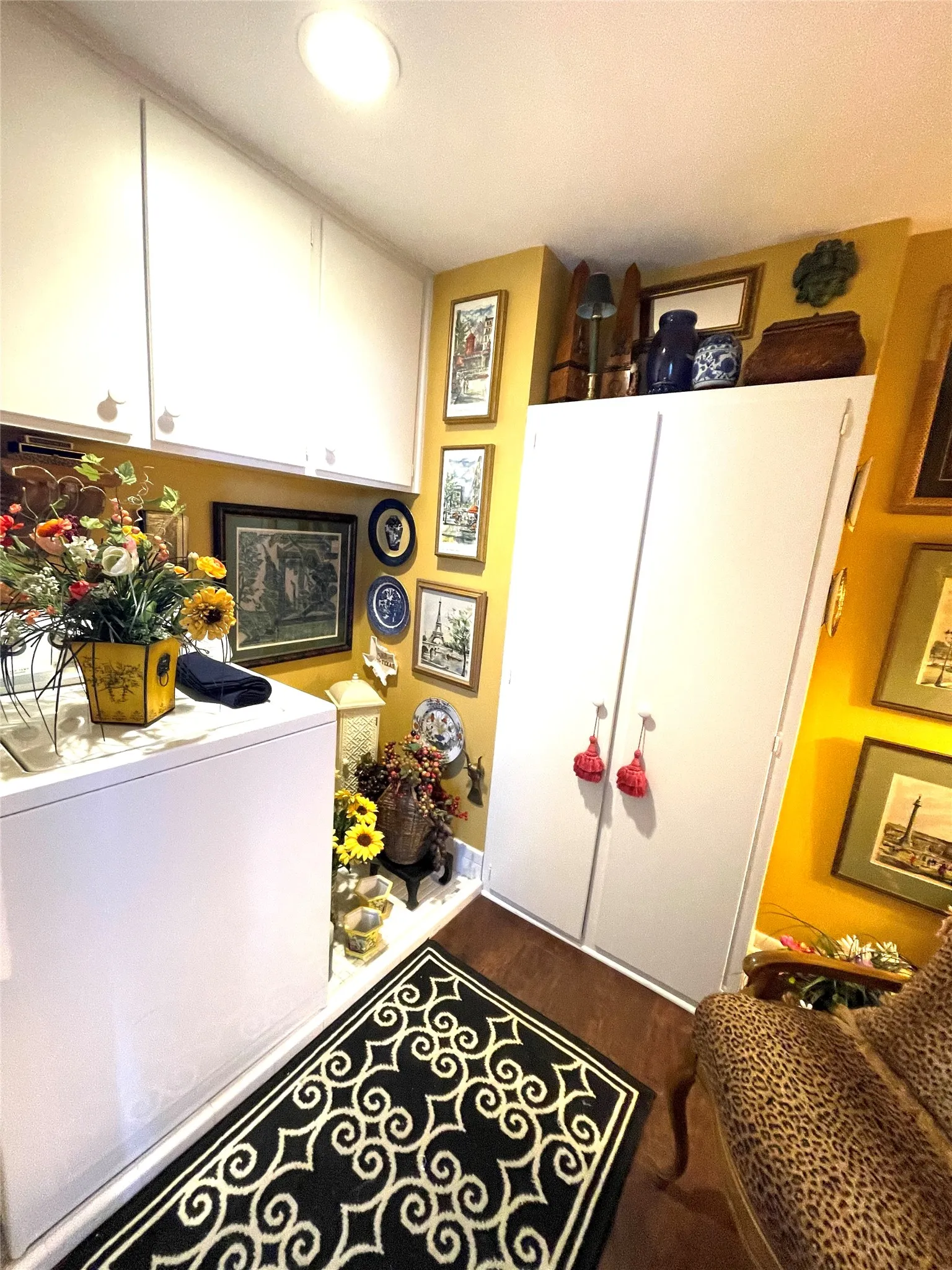 utility room for full size washer, dryer & broom closet