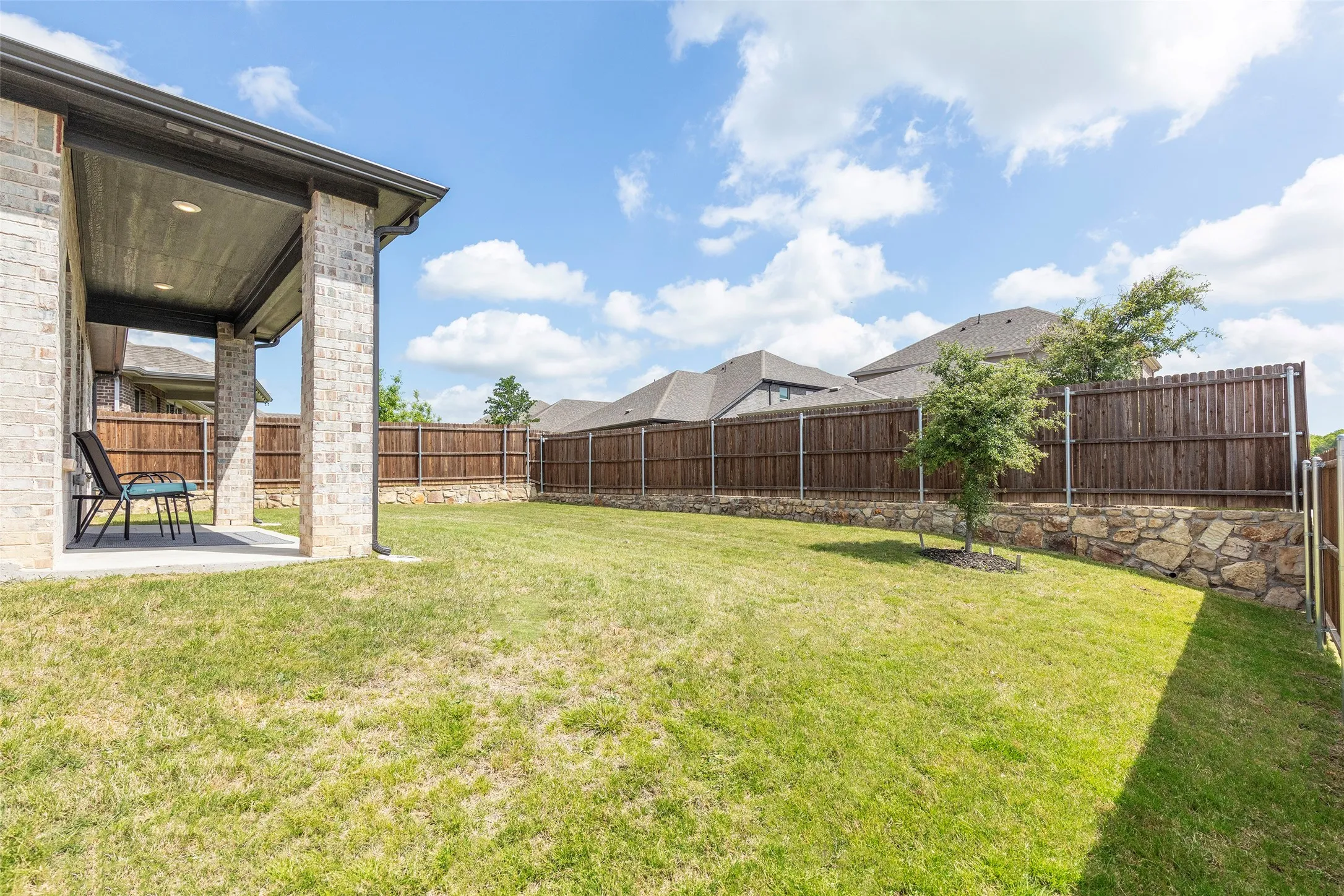 Rear elevation showcasing outdoor living and functional layout.