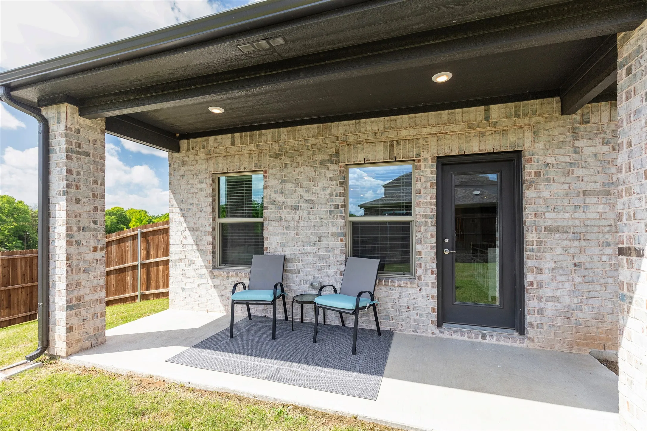 Covered patio designed for shaded outdoor relaxation.