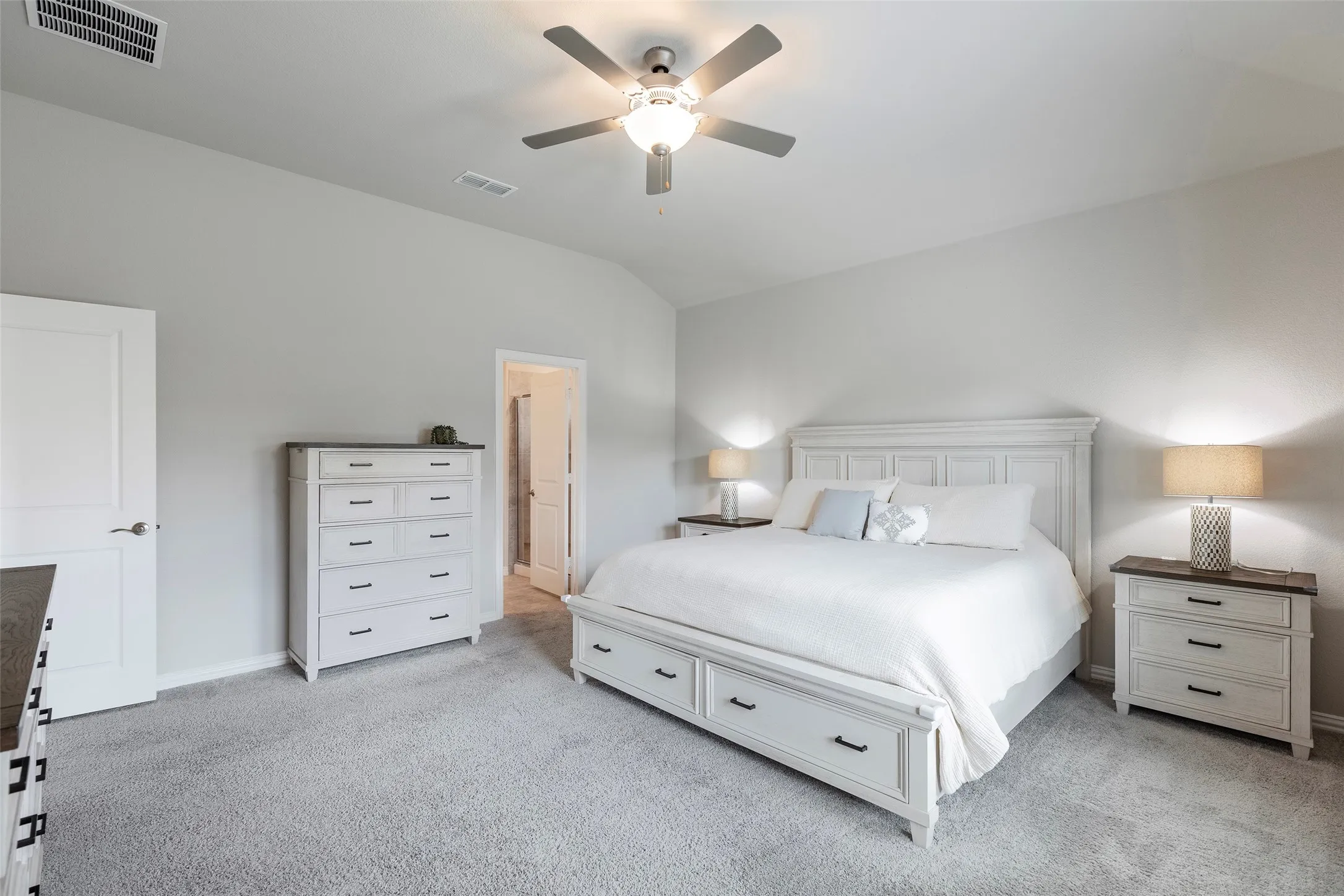 Spacious bedroom with a calm, comfortable feel.