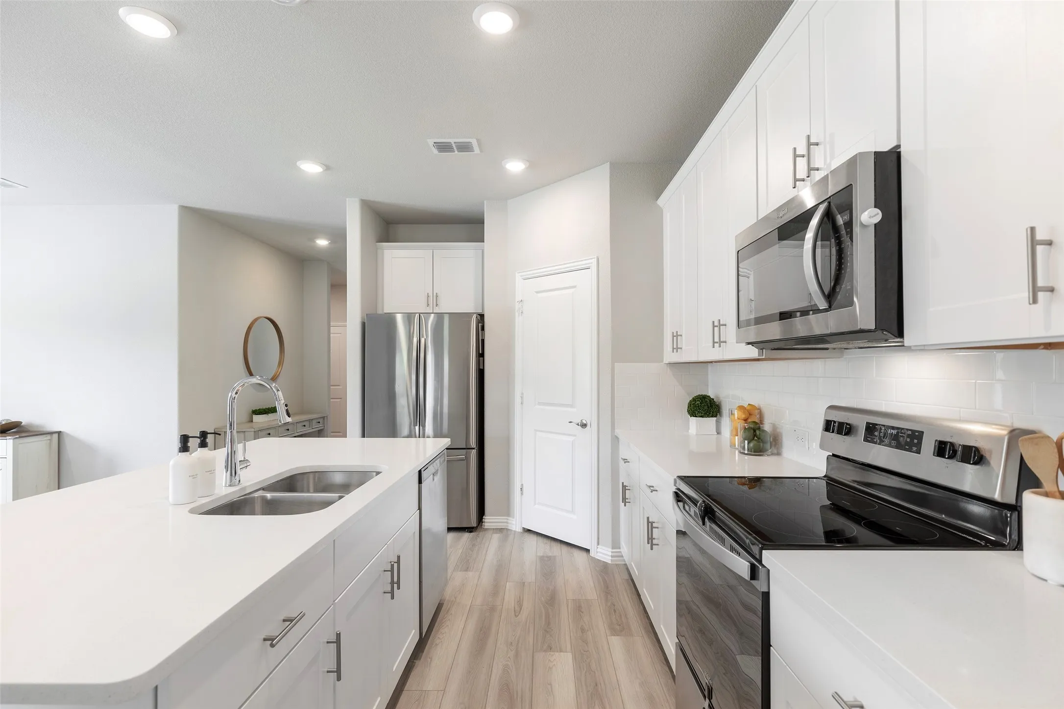Thoughtfully designed workspace with easy access to pantry.