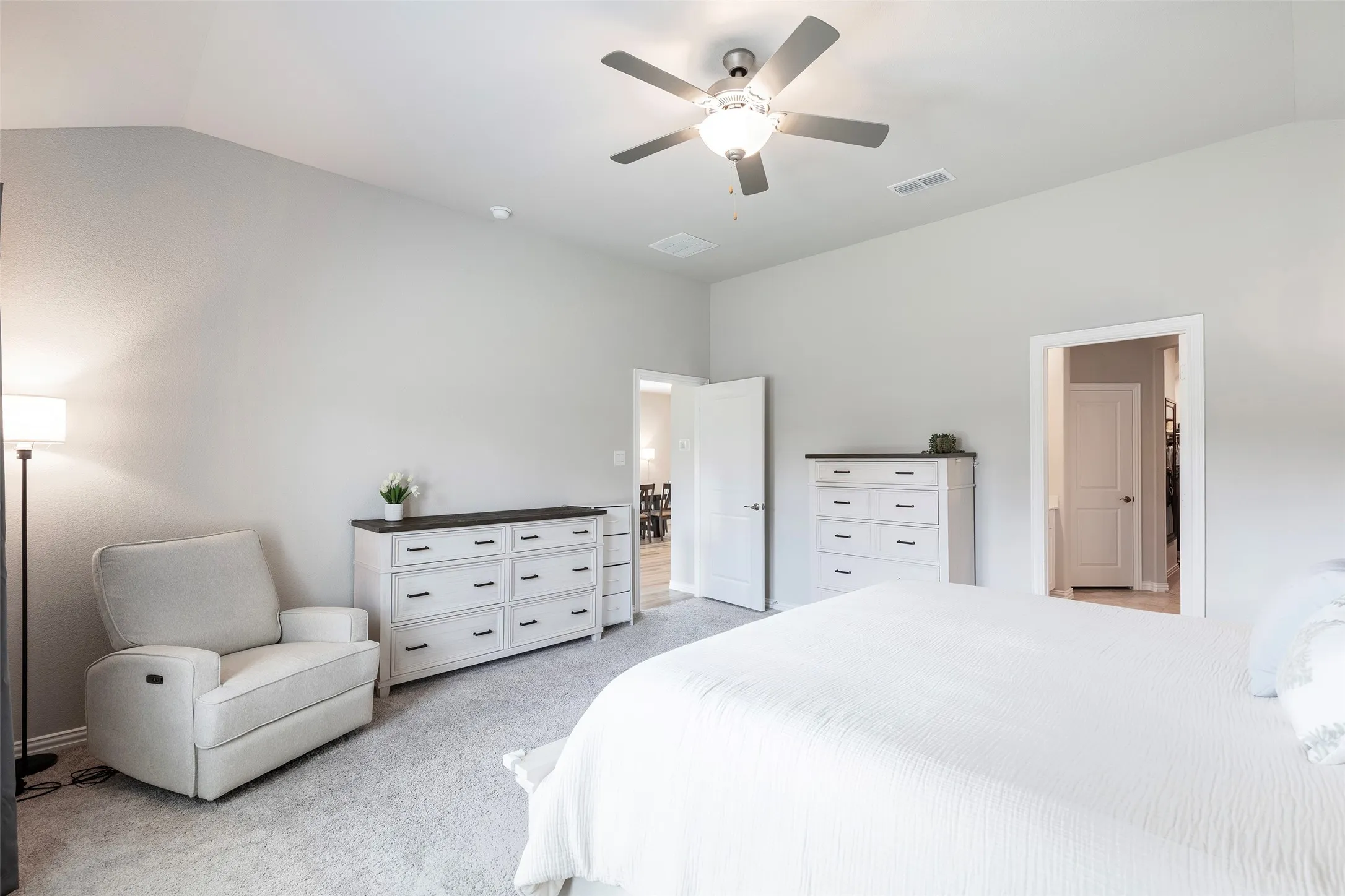 Light-filled owner’s suite with room for a sitting area.