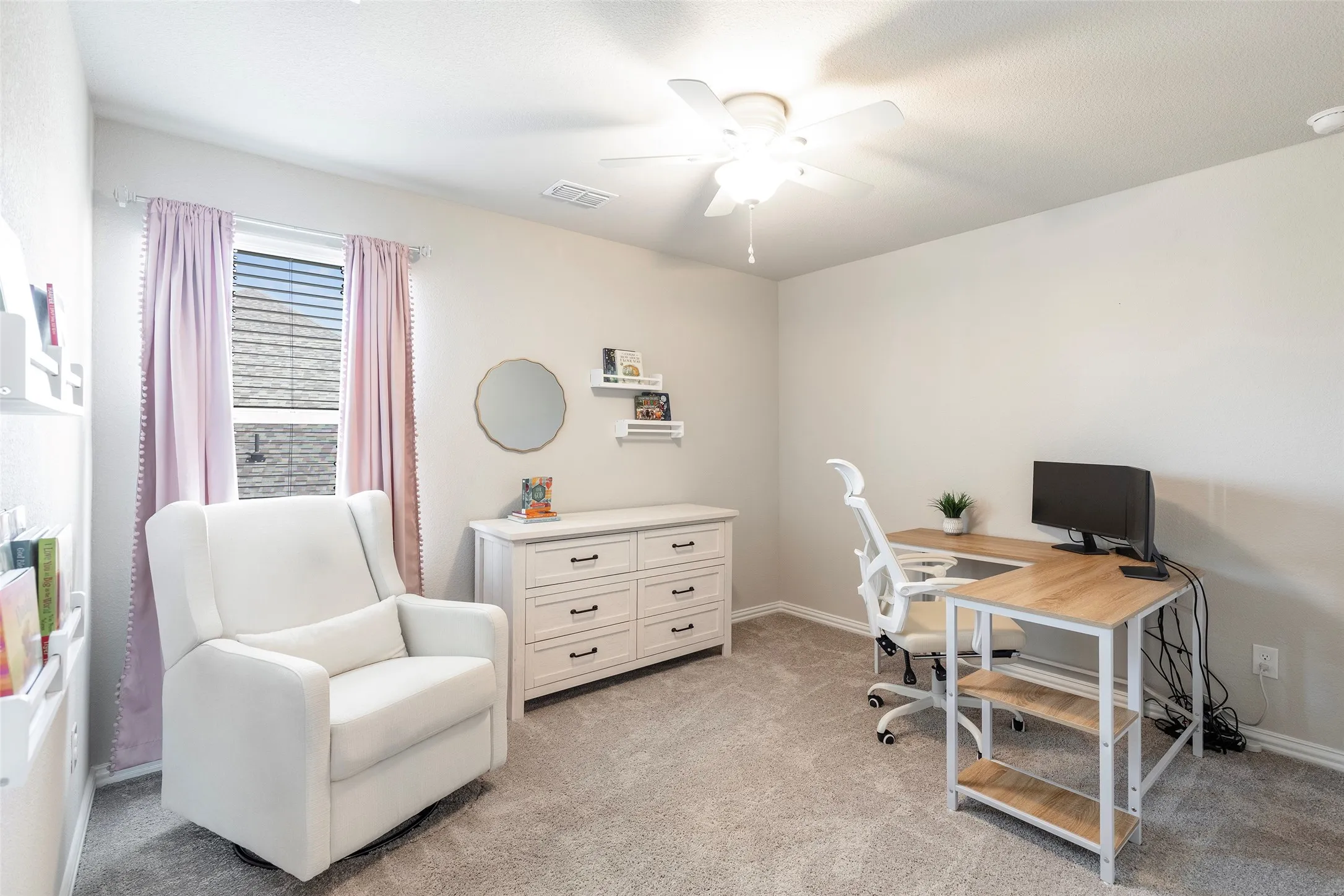 4th bedroom styled for work, reading, or quiet retreat.