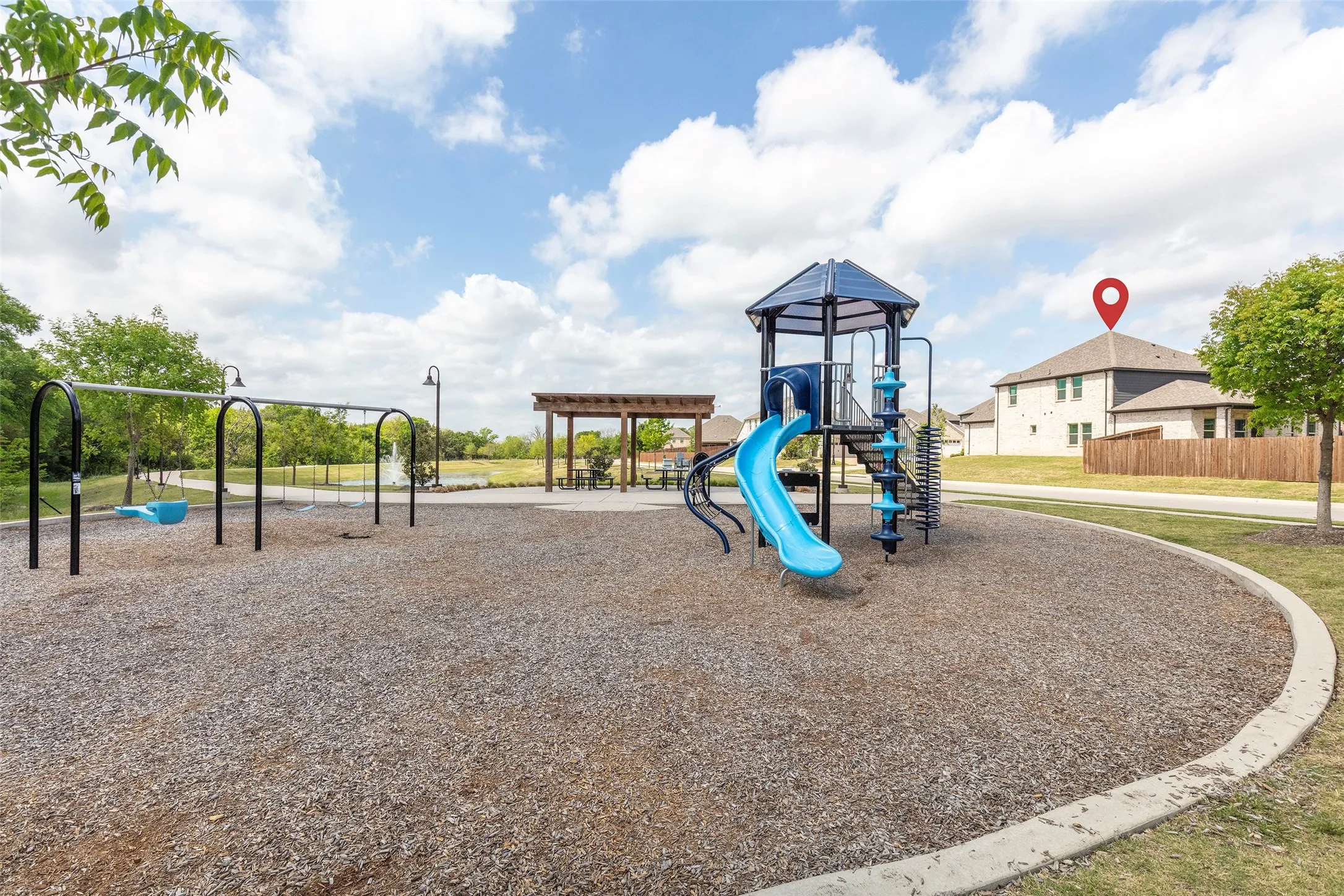 Steps from neighborhood park, pond, and walking trails.