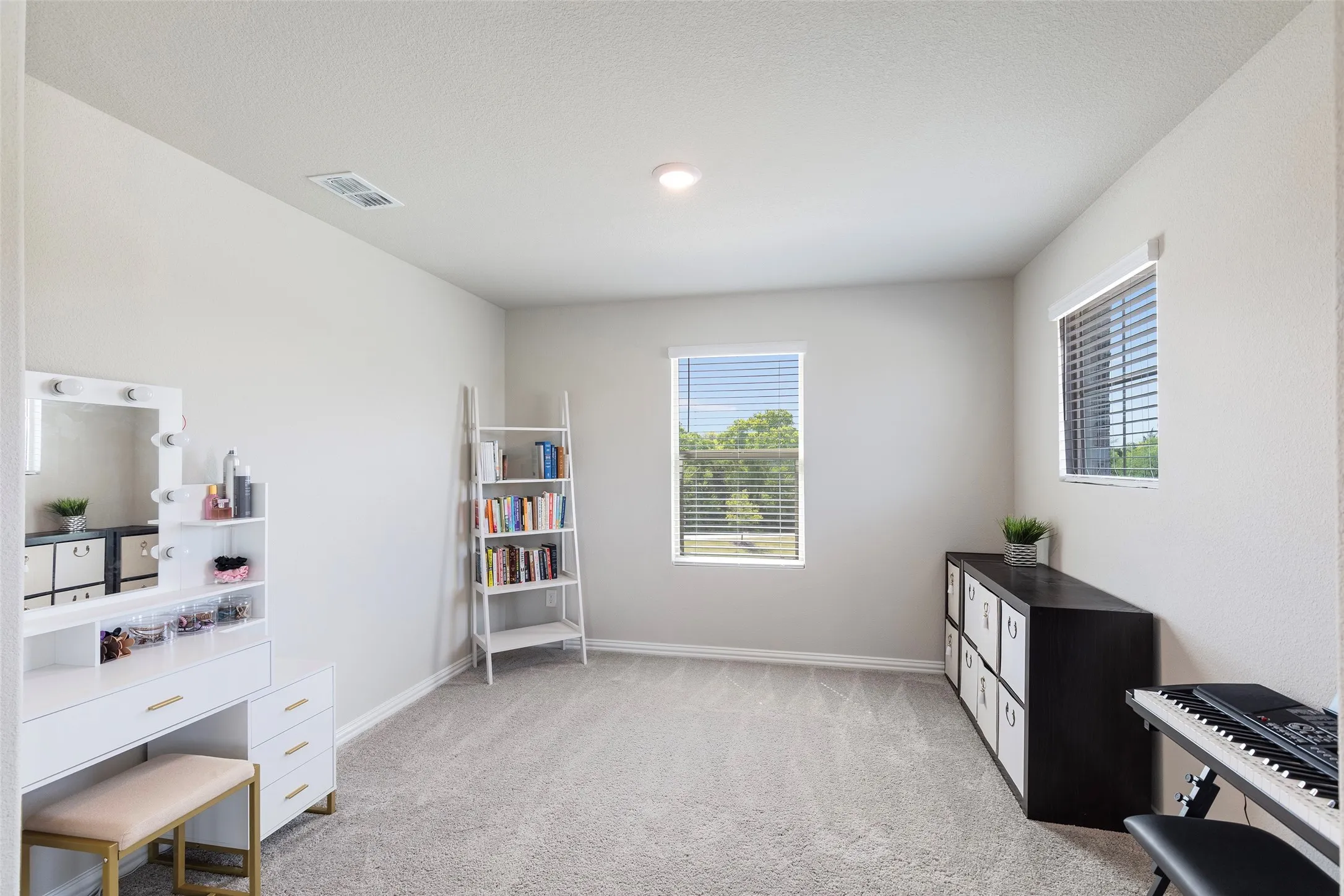 Open bonus room ideal for office, studio, or flex space.