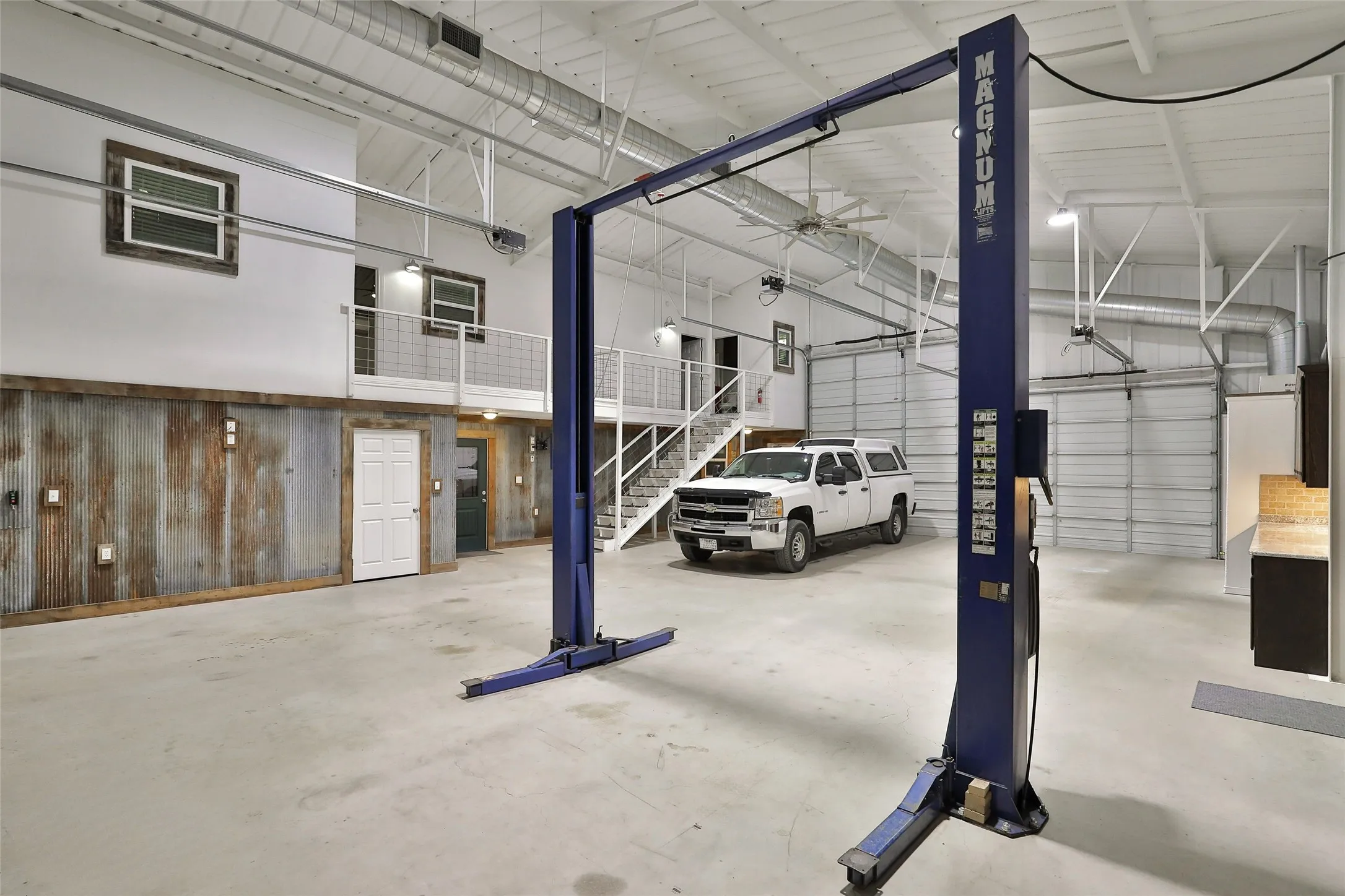 Warehouse/Man Mansion & the lift STAYS! Also not pictured is an extra room for your BIG TOYS!!!