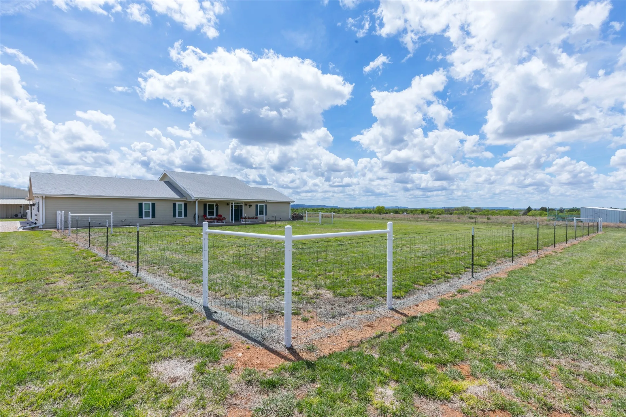 Multiple fenced-in yards located in the front and back. Ready for an in-ground pool, livestock you name it!